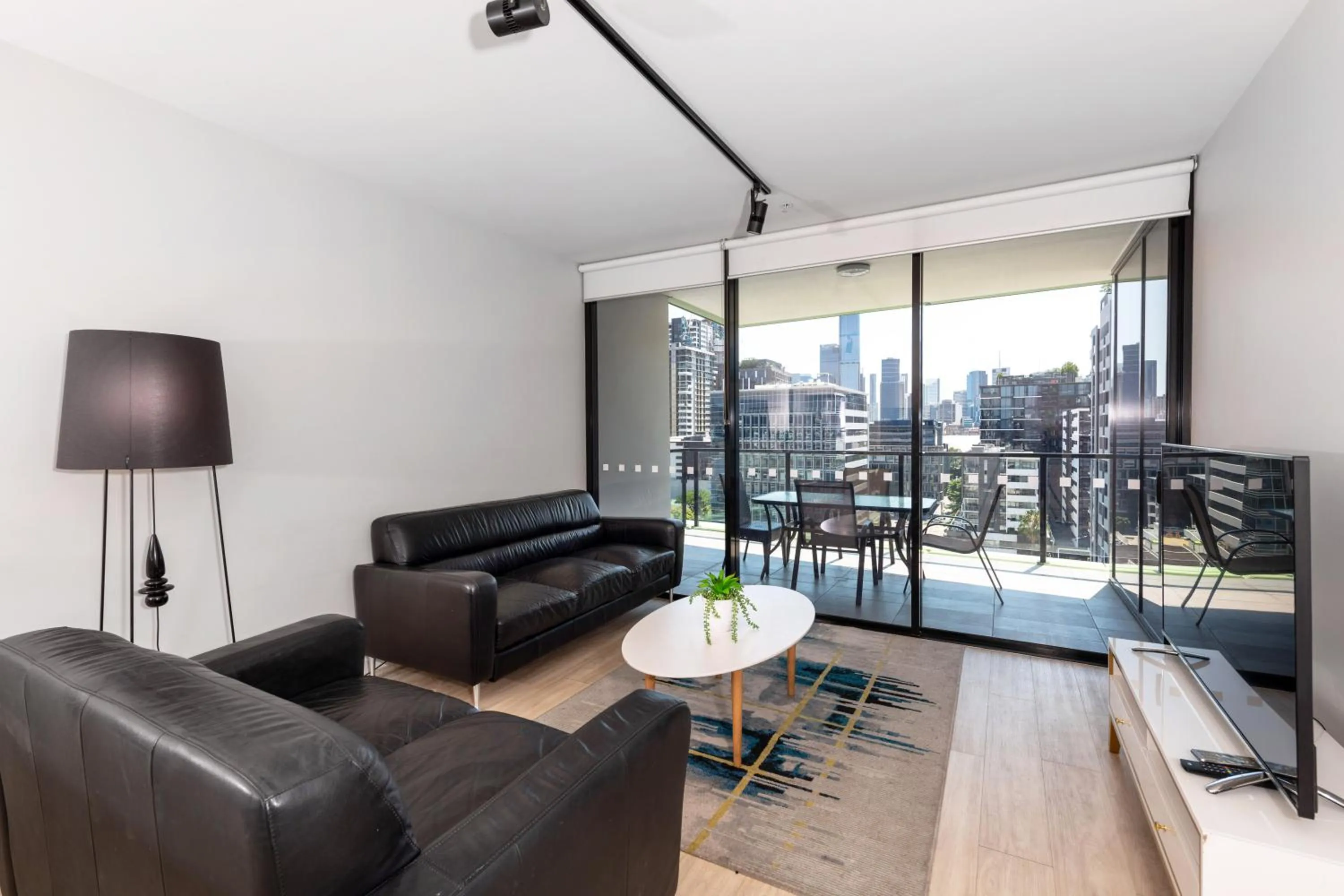 Living room in Arena Apartments by CLLIX