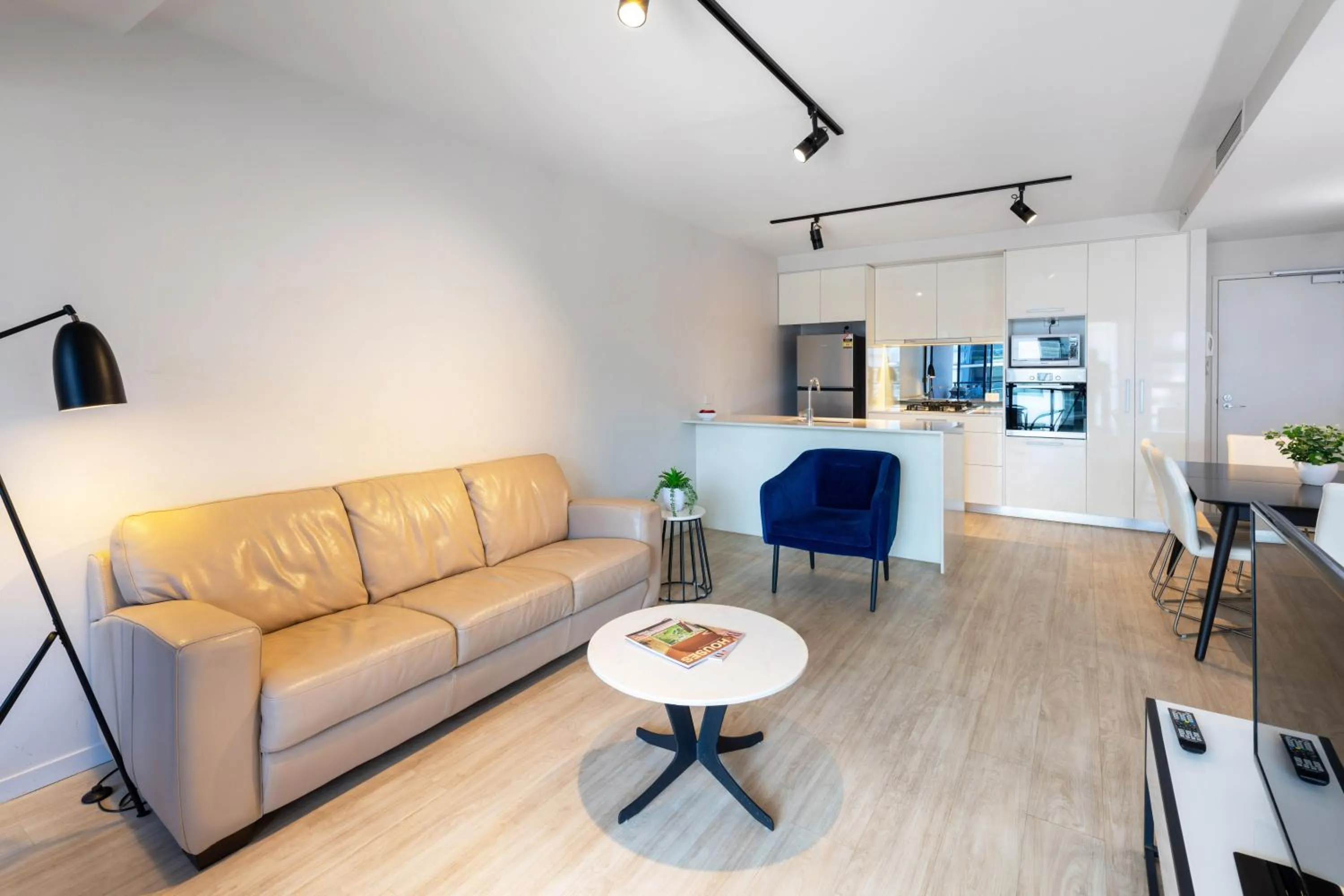 Living room in Arena Apartments by CLLIX