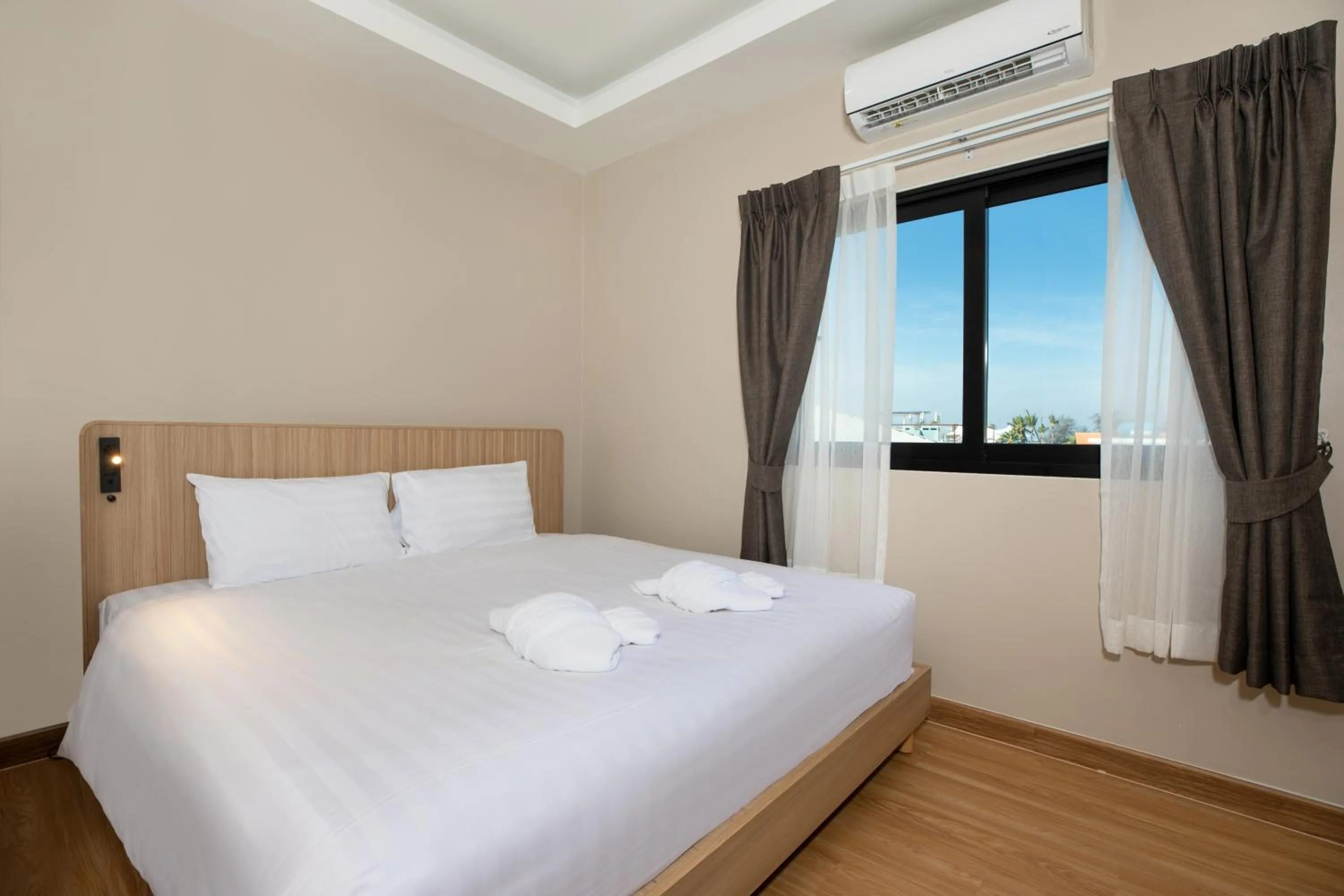 Bed in Tuna Boutique Hotel Patong