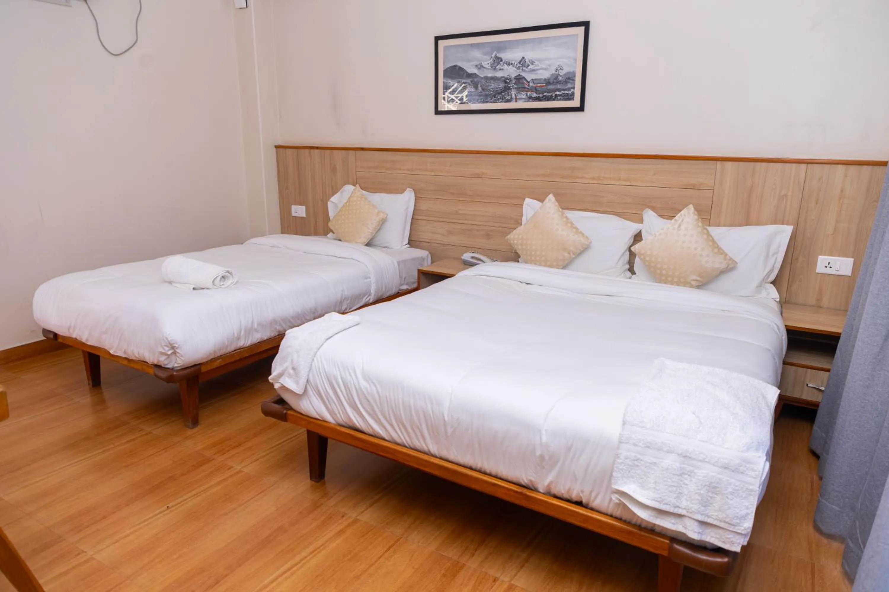 Bed in Samiyog Tourist Resort