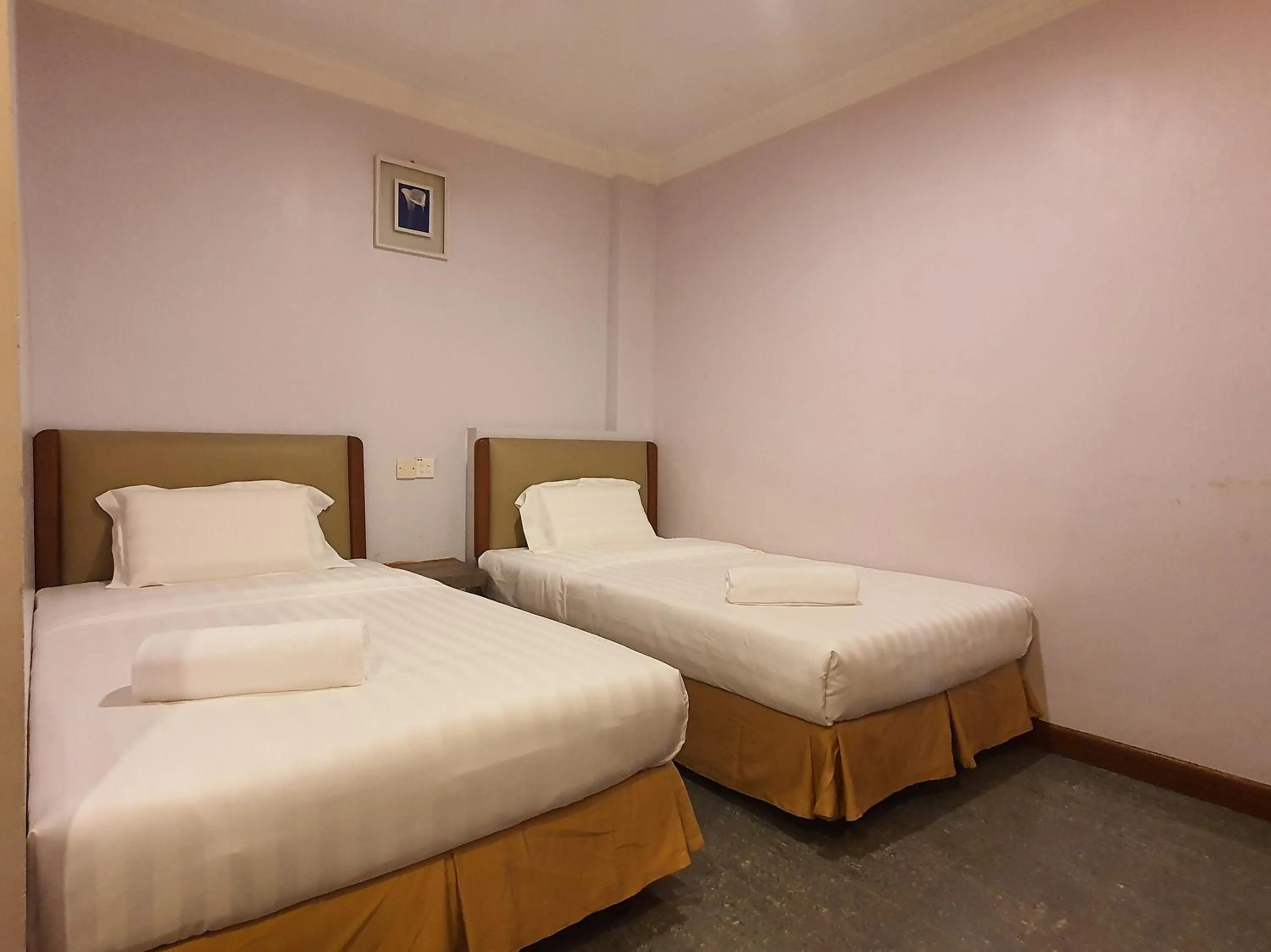 Bedroom, Bed in Capital O 90939 Sandakan Central Hotel