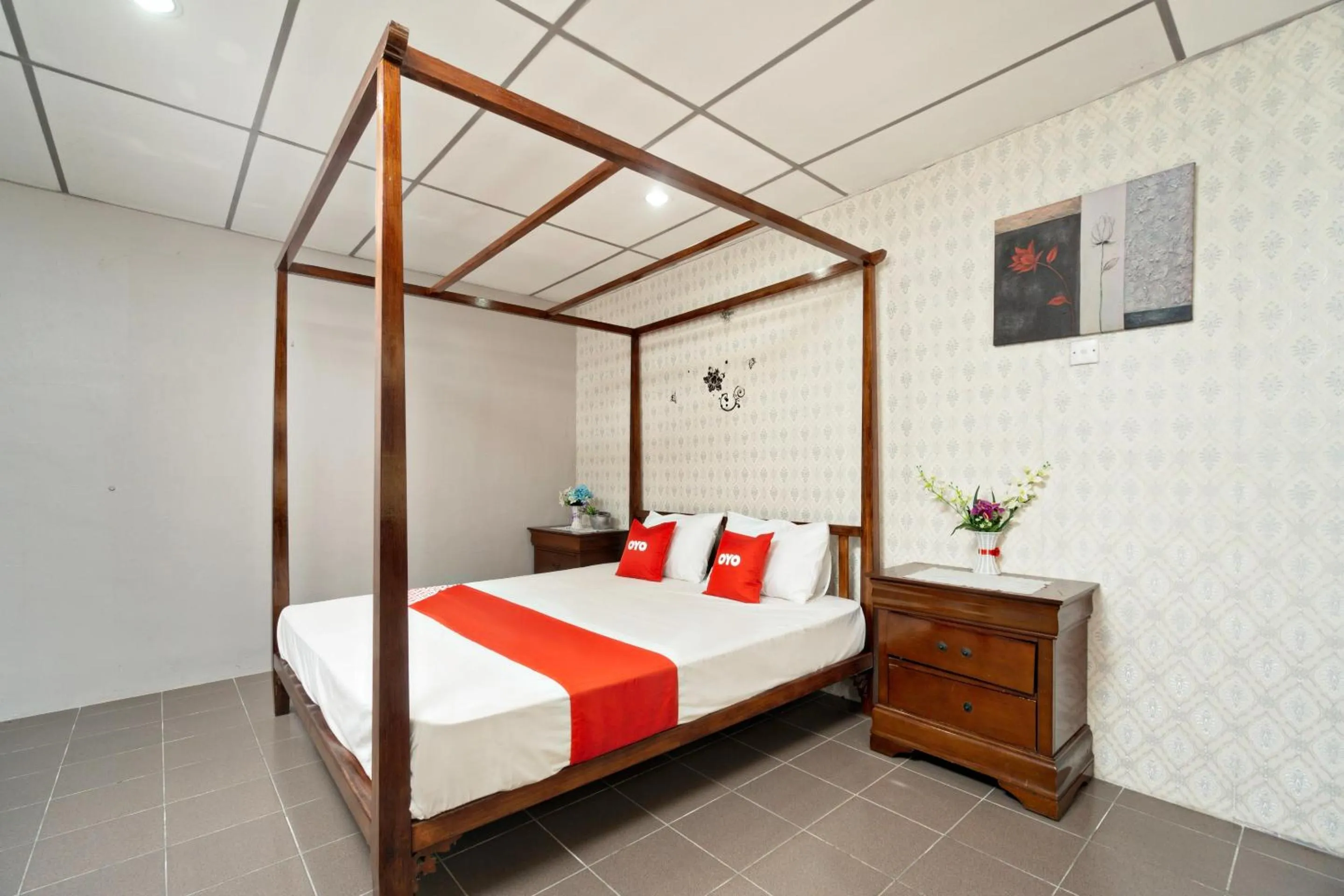 Bedroom in OYO 90929 DJ Hotel