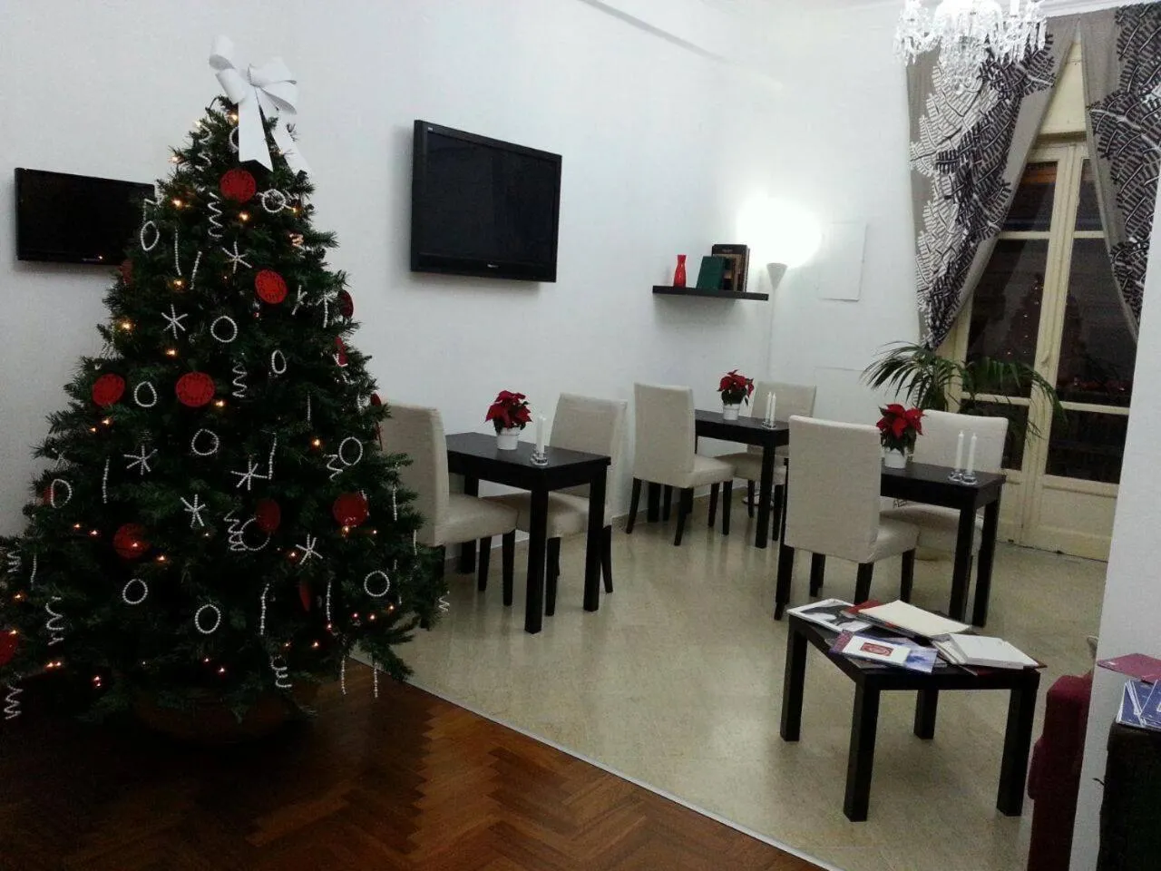 Communal lounge/ TV room in B&B Paolo e Mariella