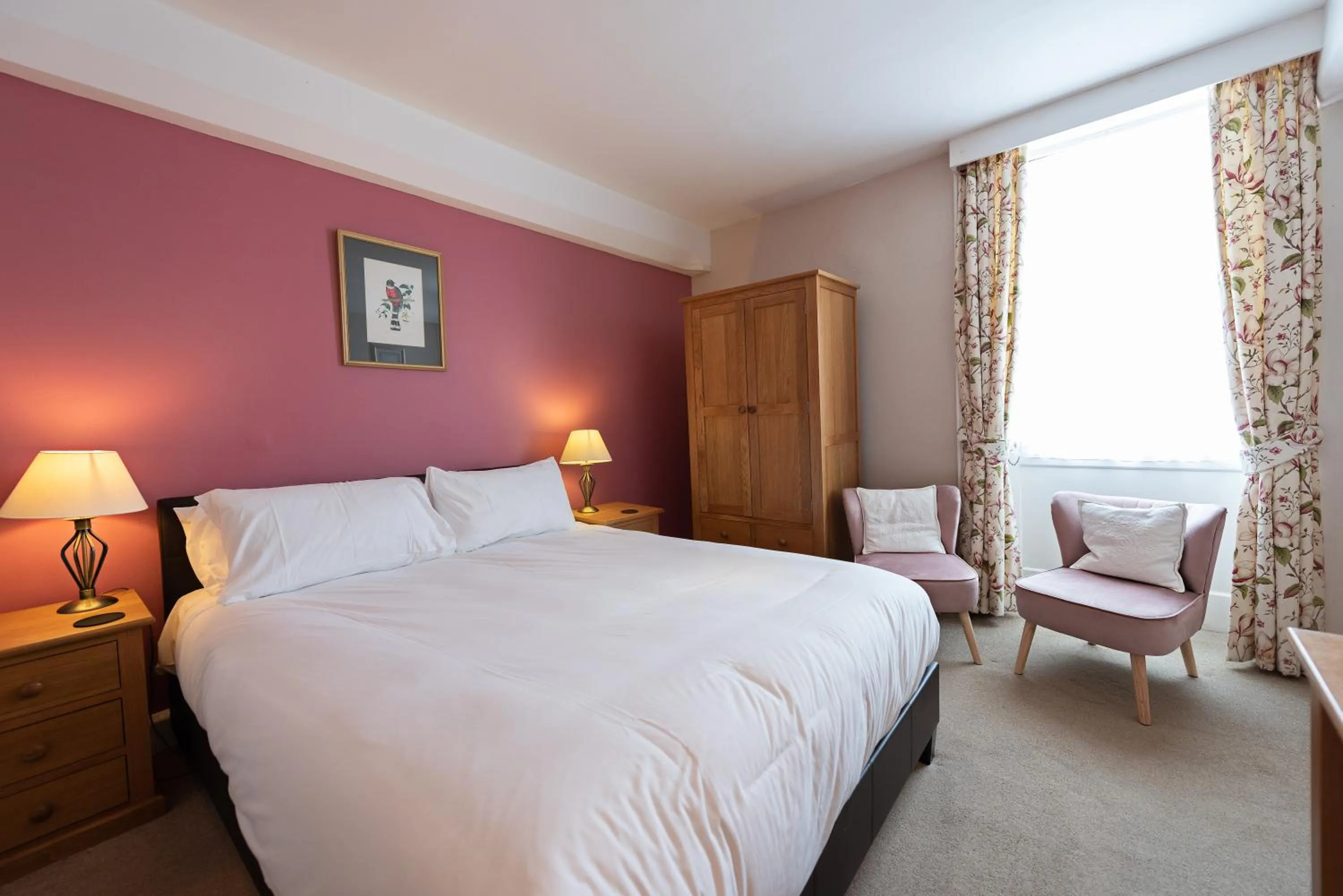 Bed in Corinium Hotel & Restaurant