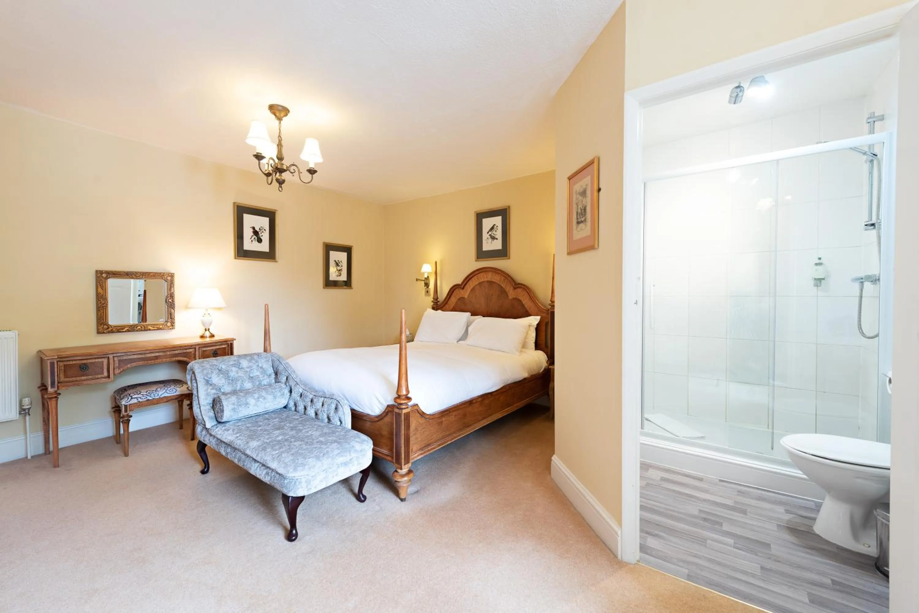 Bed in Corinium Hotel & Restaurant