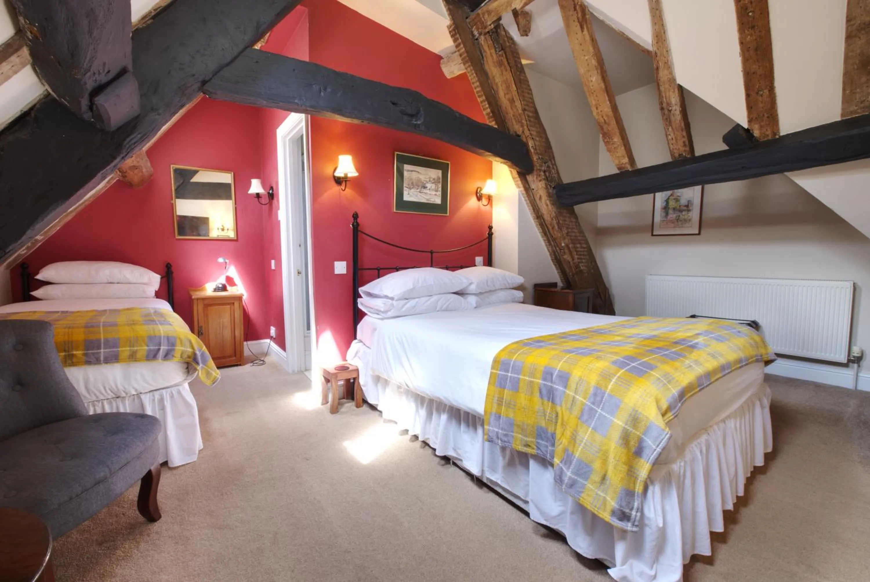 Bed in Corinium Hotel & Restaurant