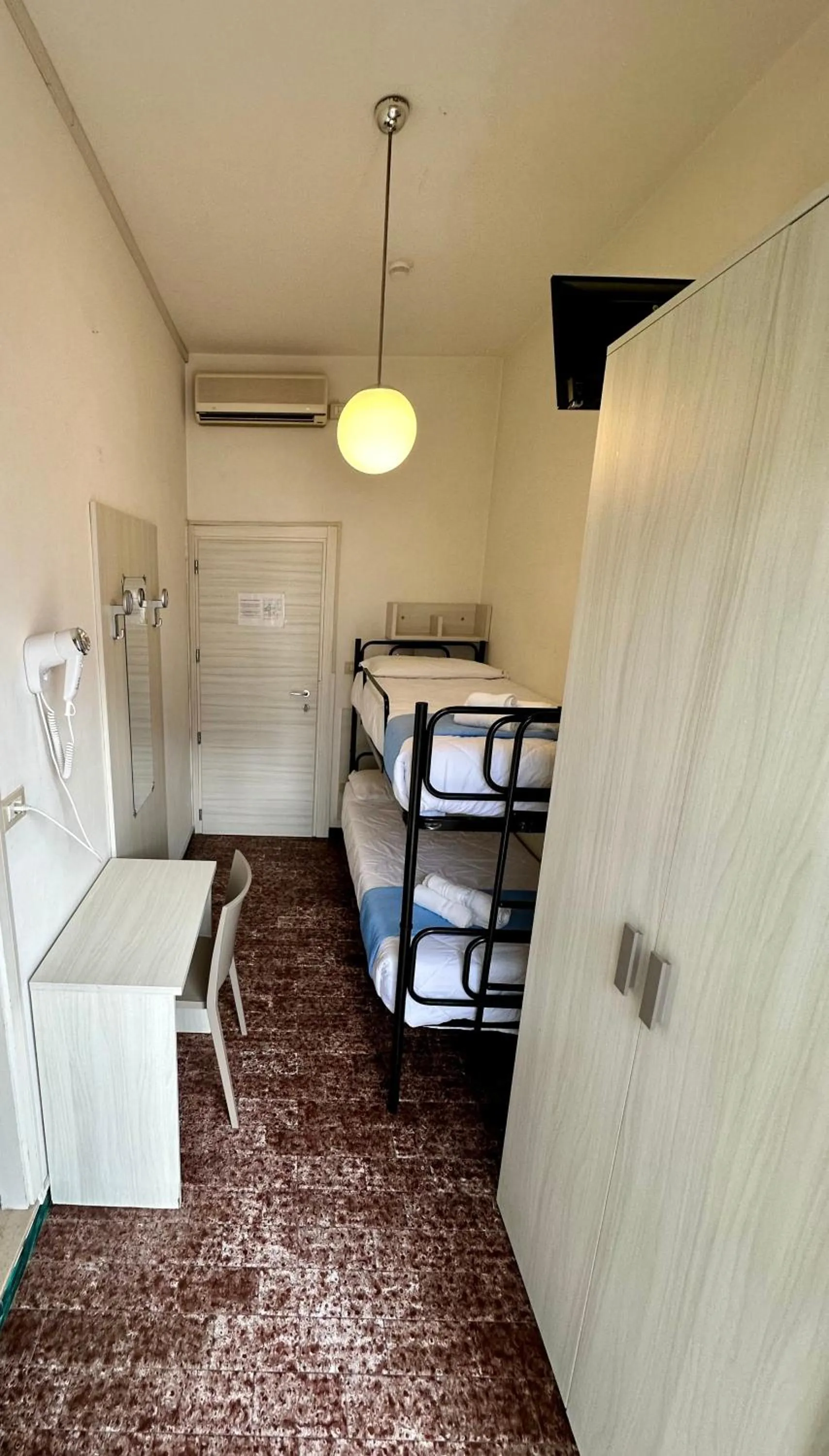 wardrobe, Bed in Hotel Napoleon