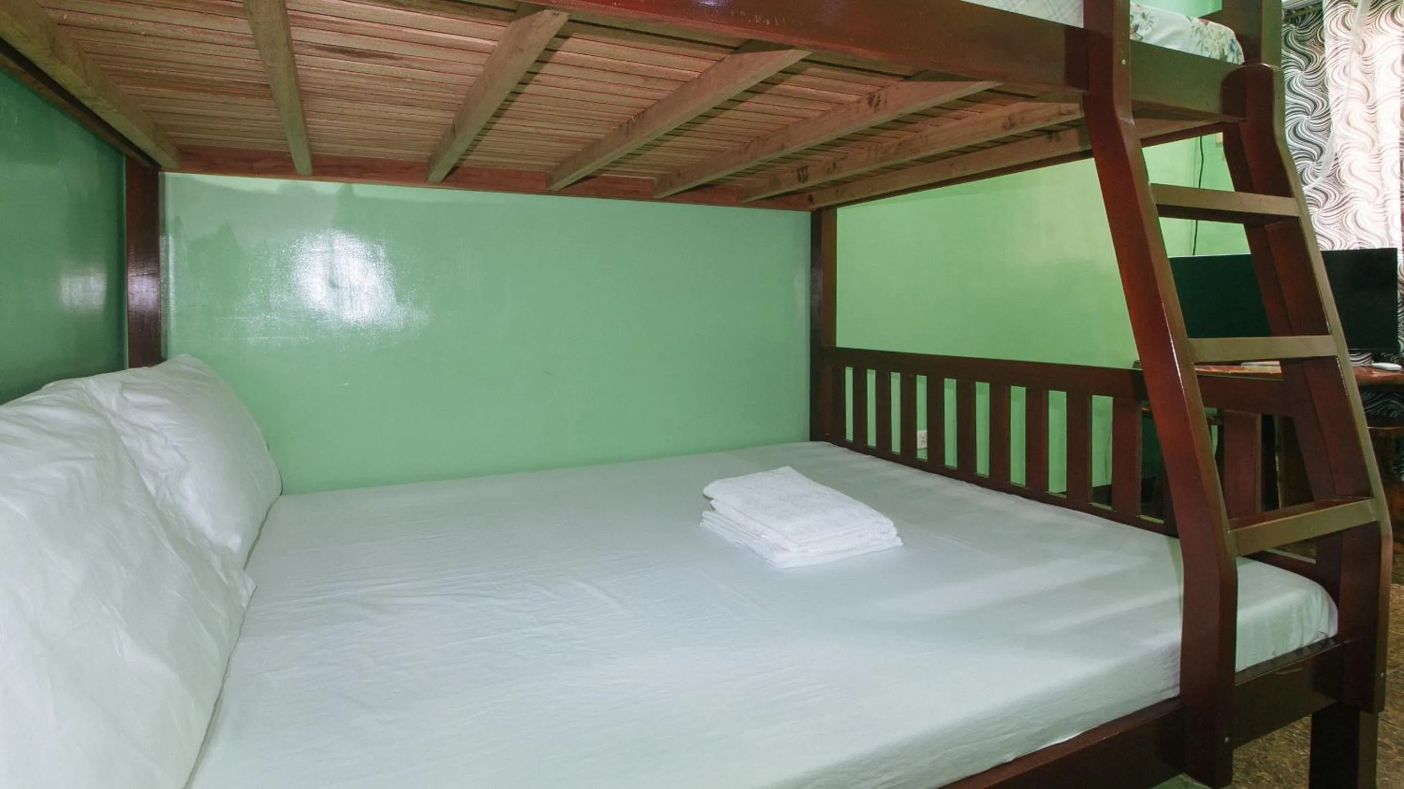 Bed in Zids Island Emprise Beach House