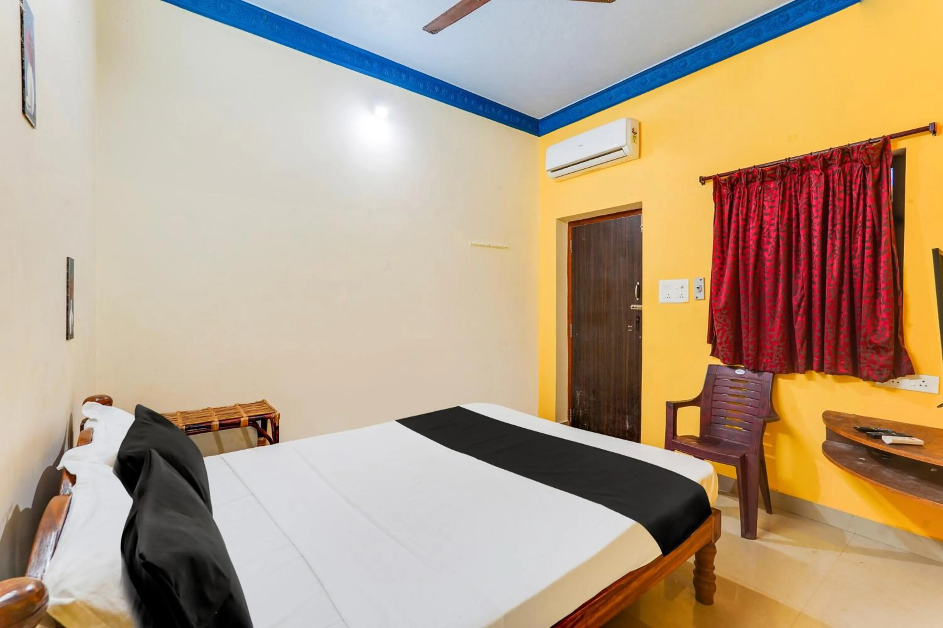 Bedroom, Bed in Hotel O Raghul Residency