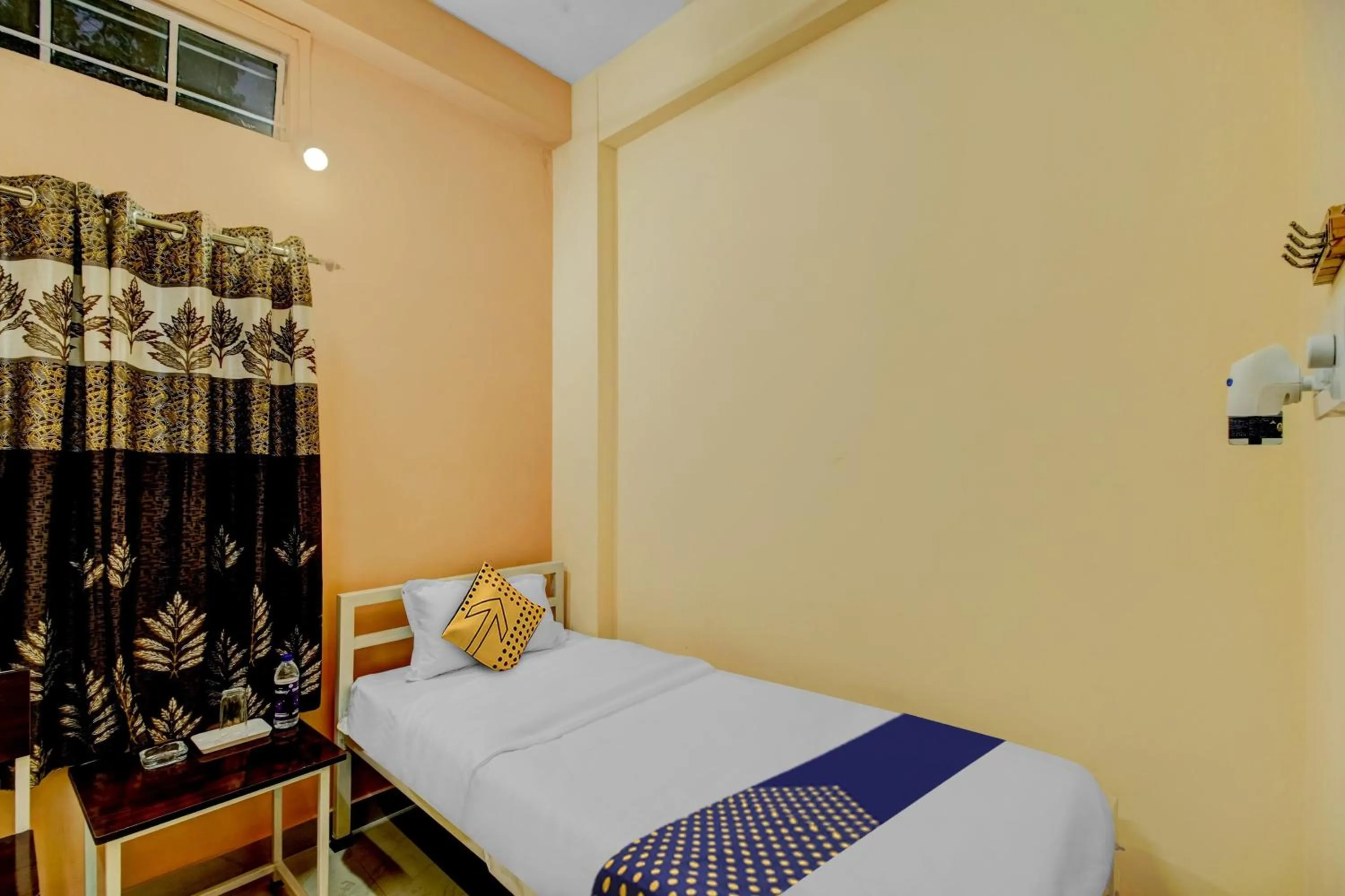 Bedroom, Bed in SPOT ON Rainbow Lodge