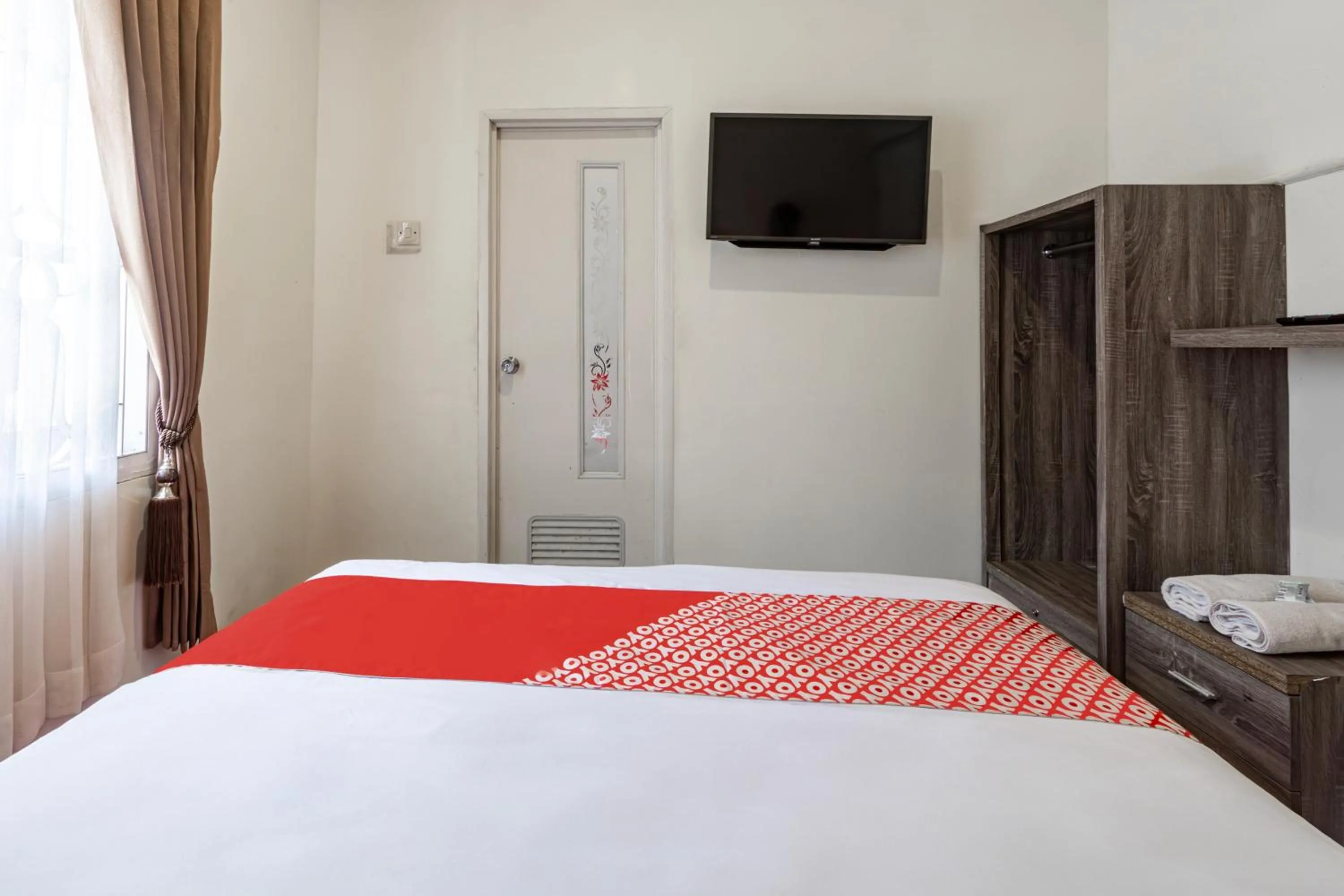 Bedroom in Hotel O Bidara Guest House Syariah