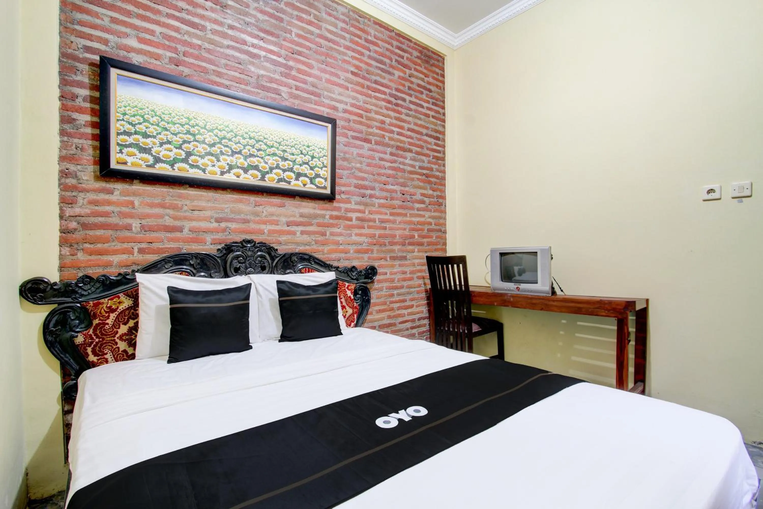 Bedroom in Capital O 93716 Family Guesthouse Syariah