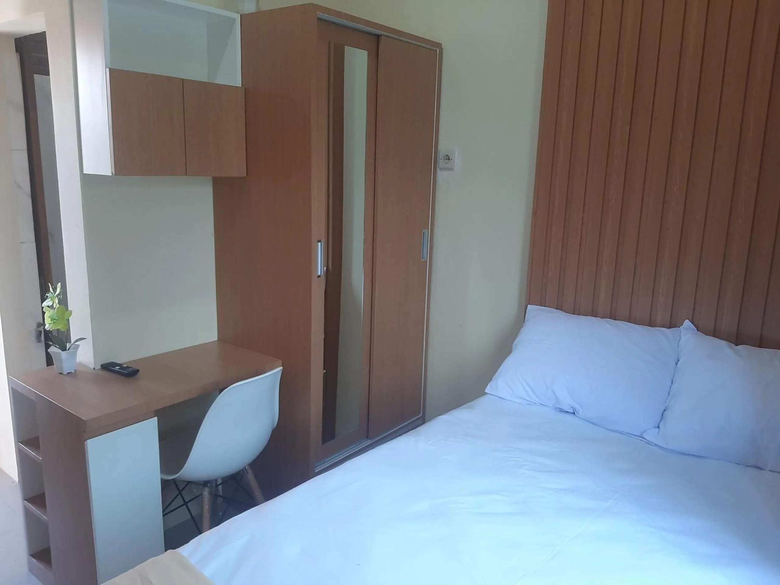 Bedroom in Capital O 93719 Homestay Omah Bidadari