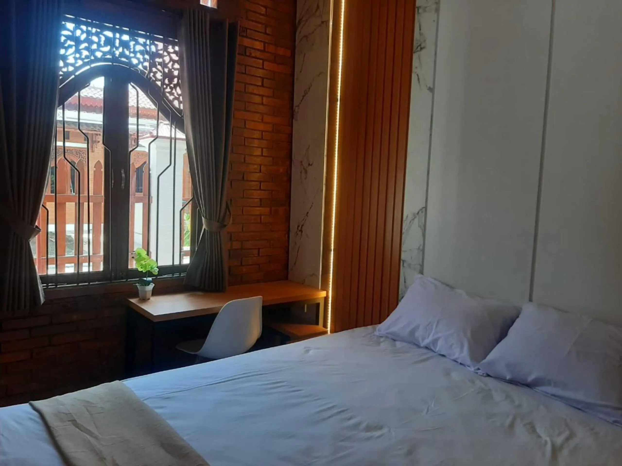 Bedroom in Capital O 93719 Homestay Omah Bidadari