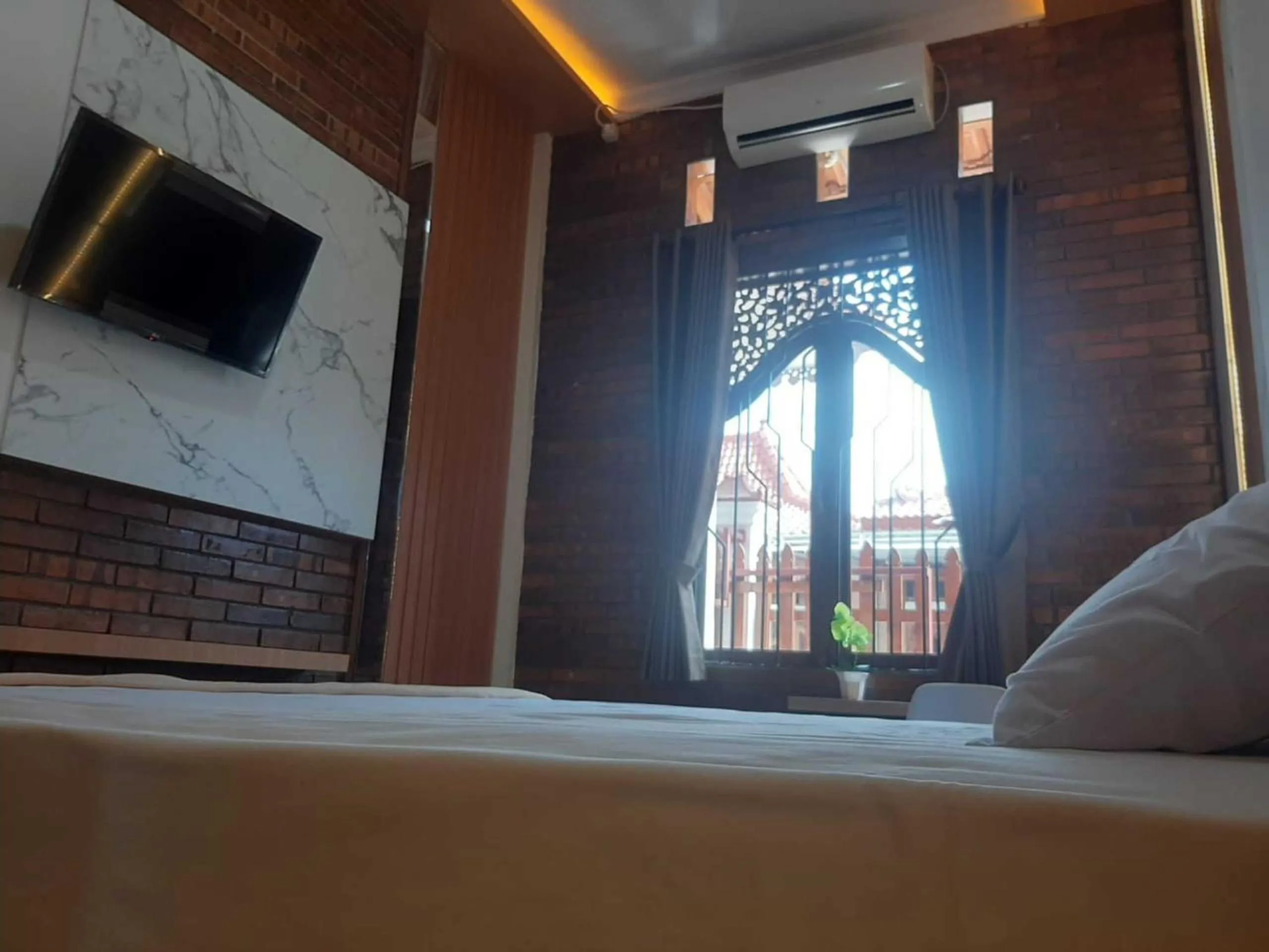 Bedroom in Capital O 93719 Homestay Omah Bidadari
