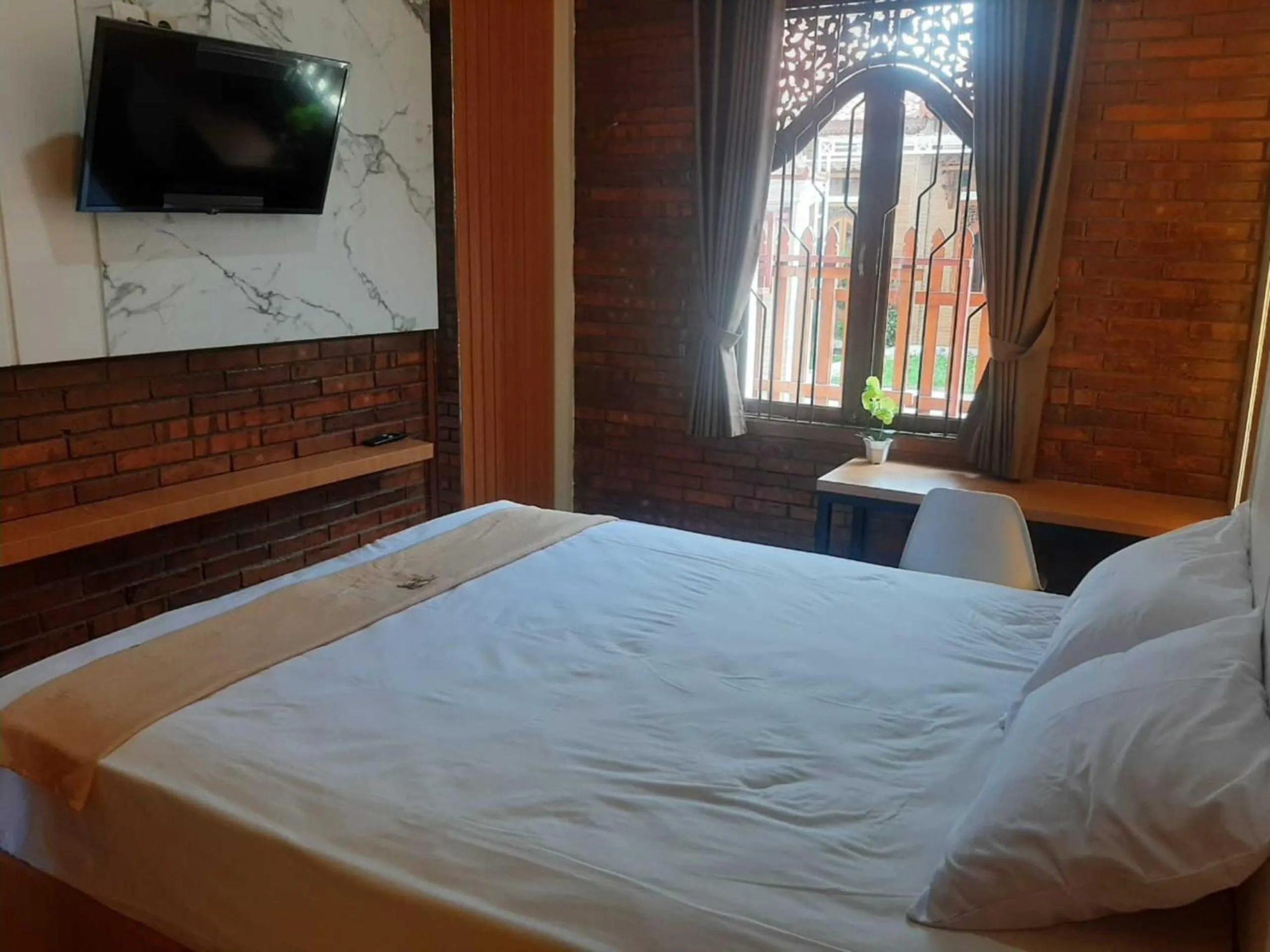 Bedroom in Capital O 93719 Homestay Omah Bidadari