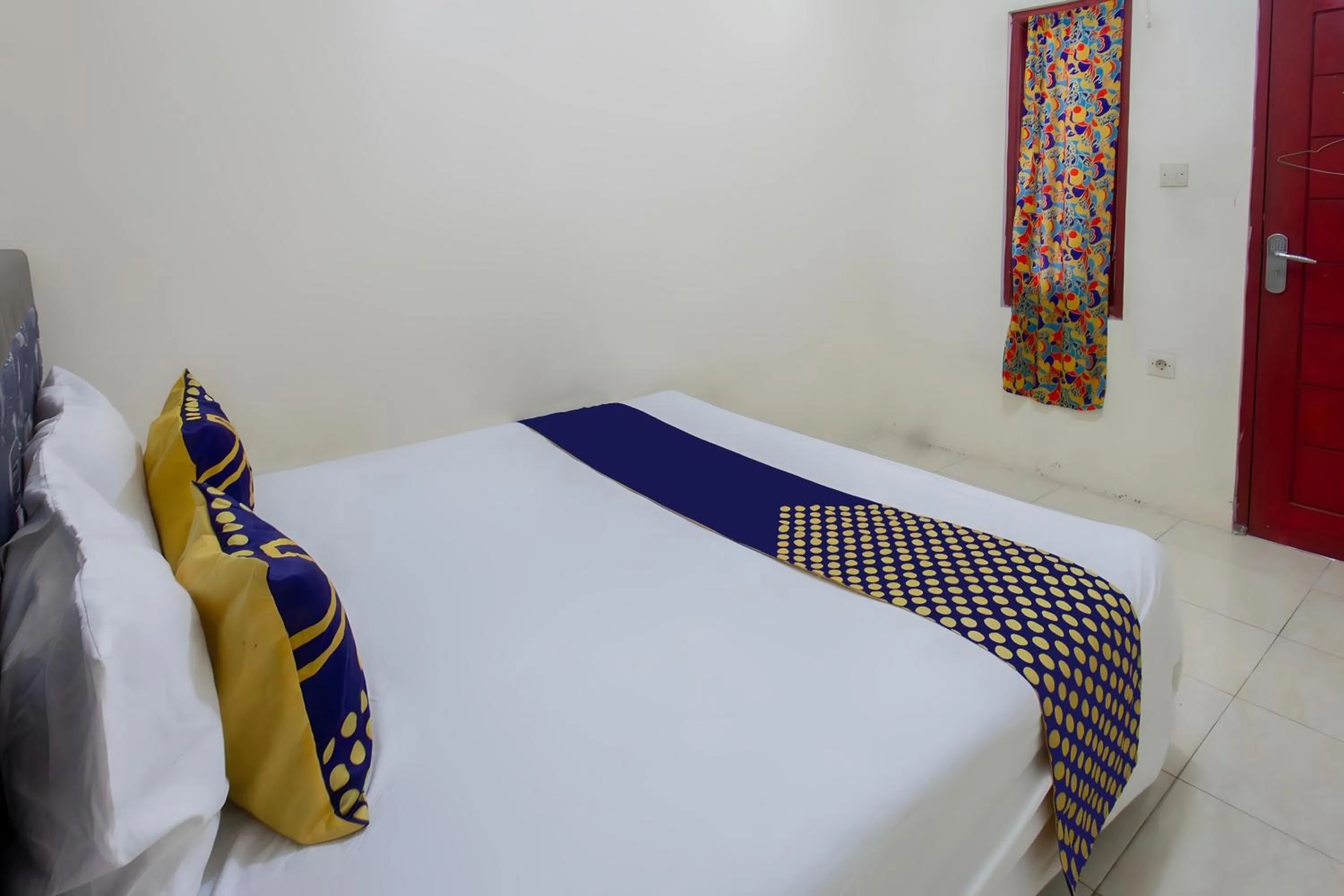 Bedroom, Bed in SPOT ON 93724 Songgong Homestay