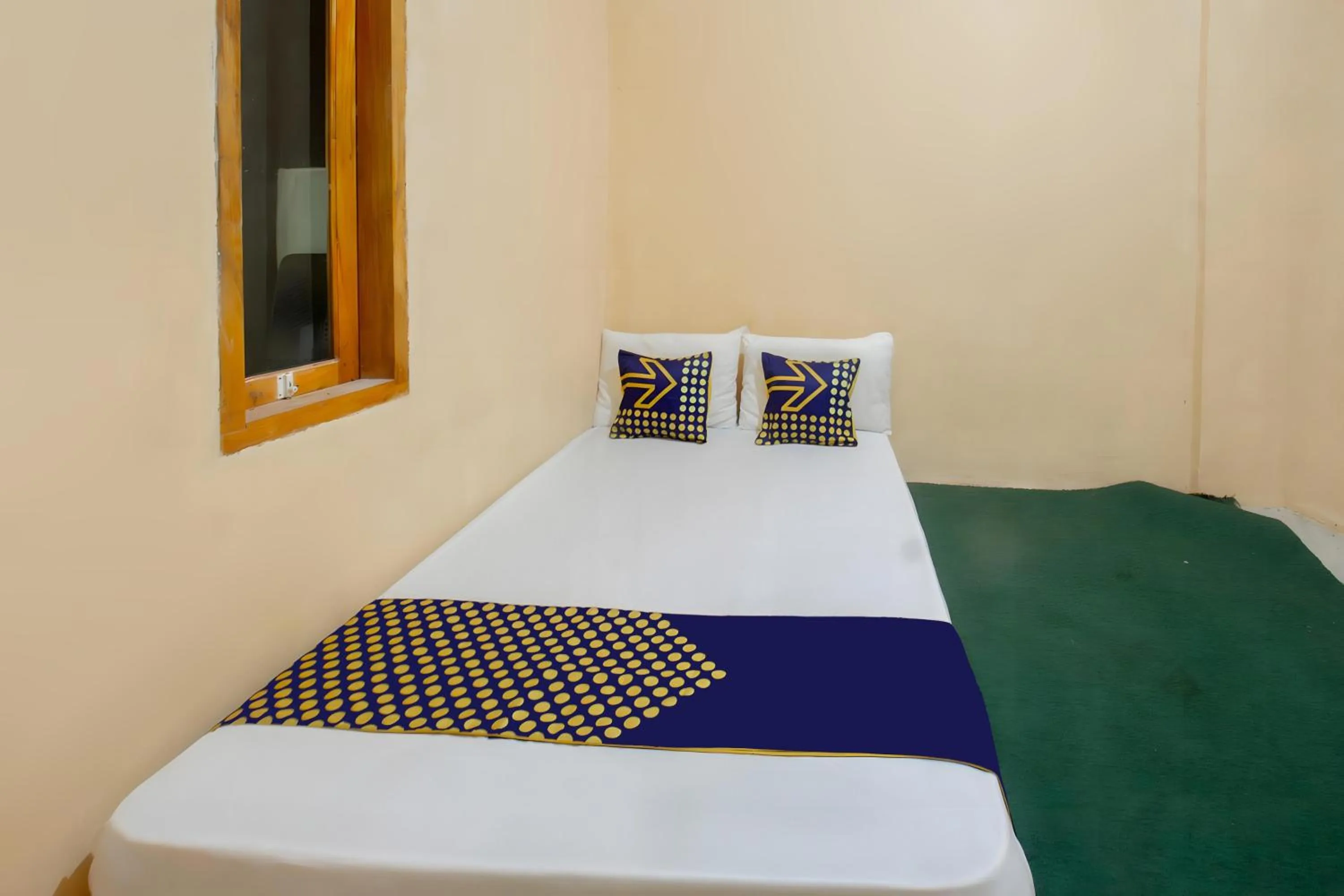 Bedroom, Bed in SPOT ON 93724 Songgong Homestay