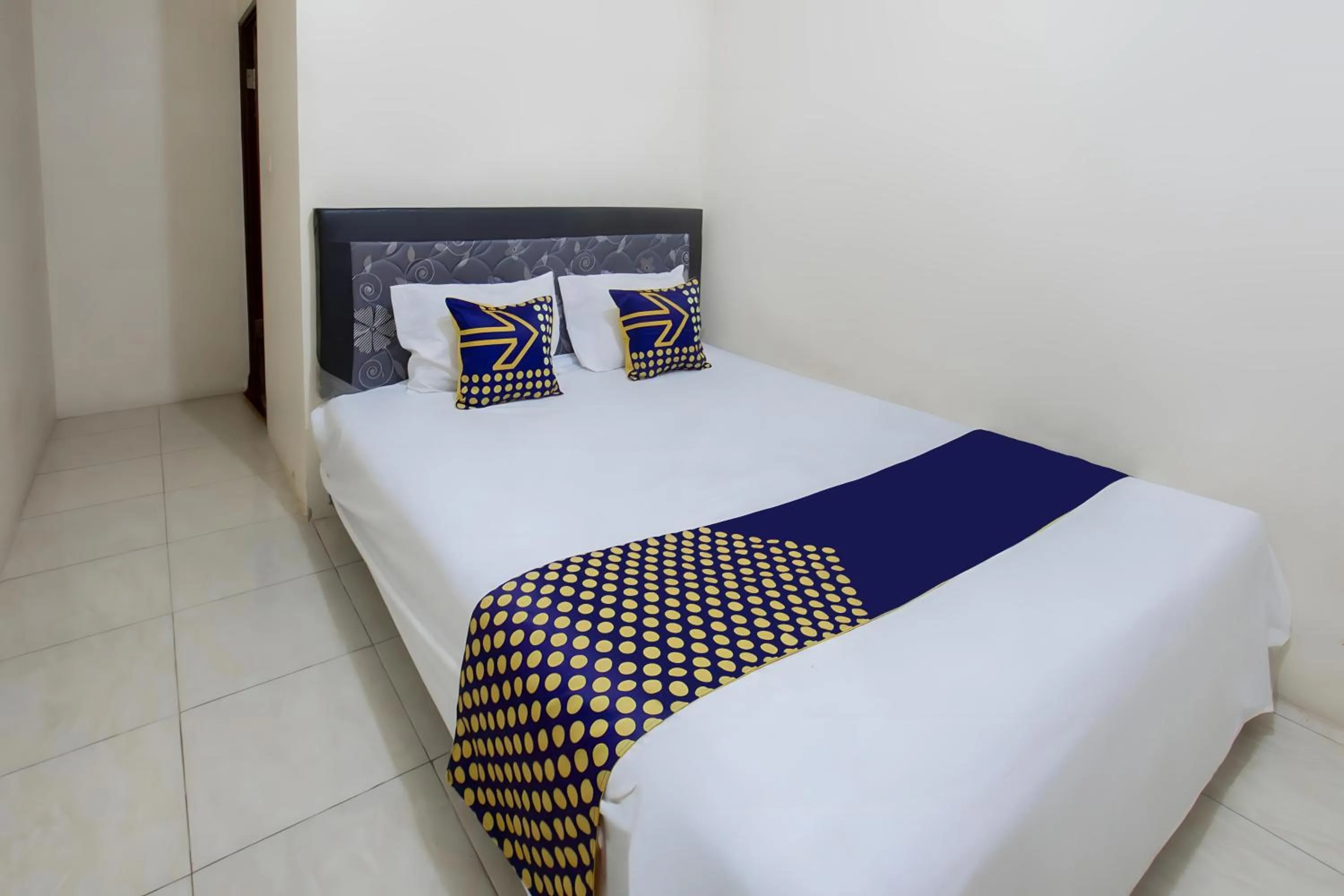 Bedroom, Bed in SPOT ON 93724 Songgong Homestay