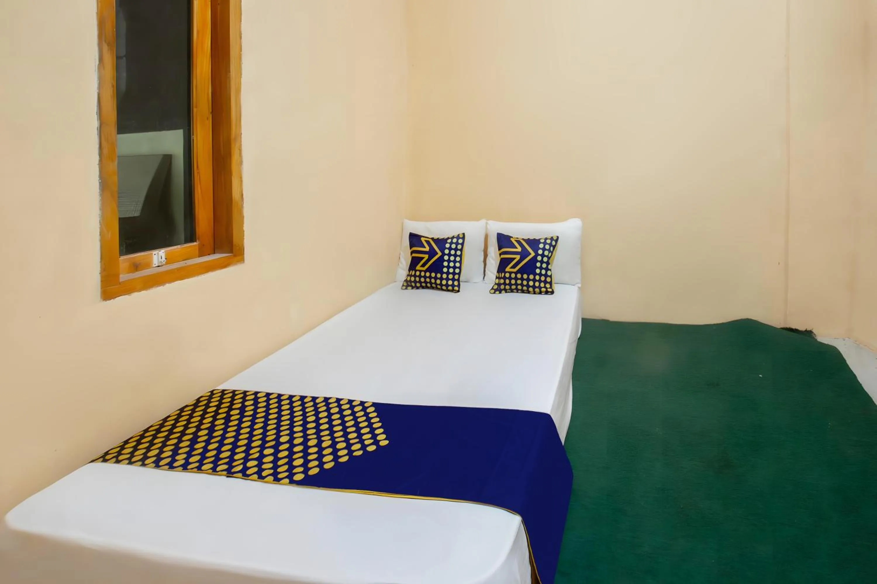 Bedroom, Bed in SPOT ON 93724 Songgong Homestay