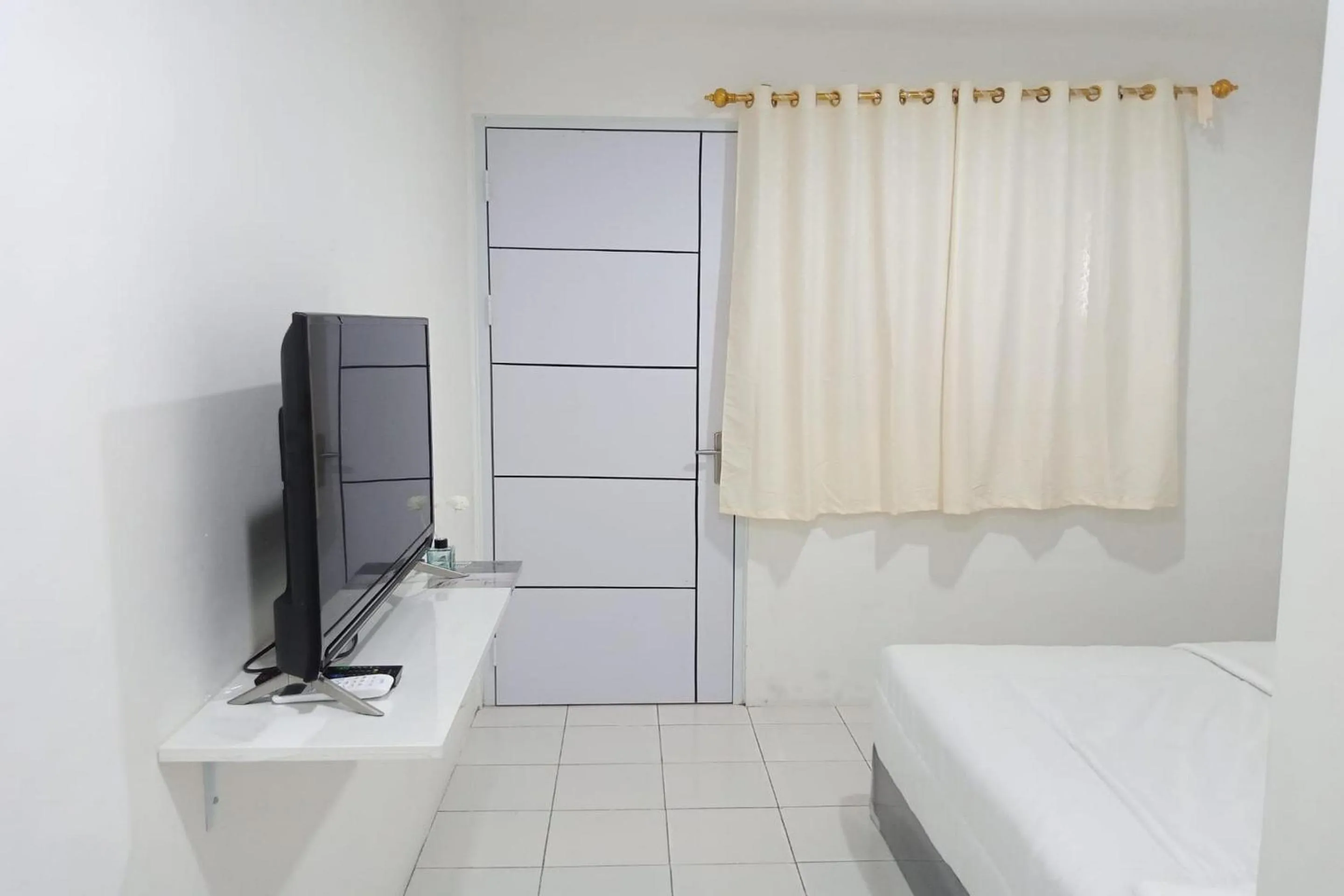 Bedroom in Capital O 93728 Guest House Cemara