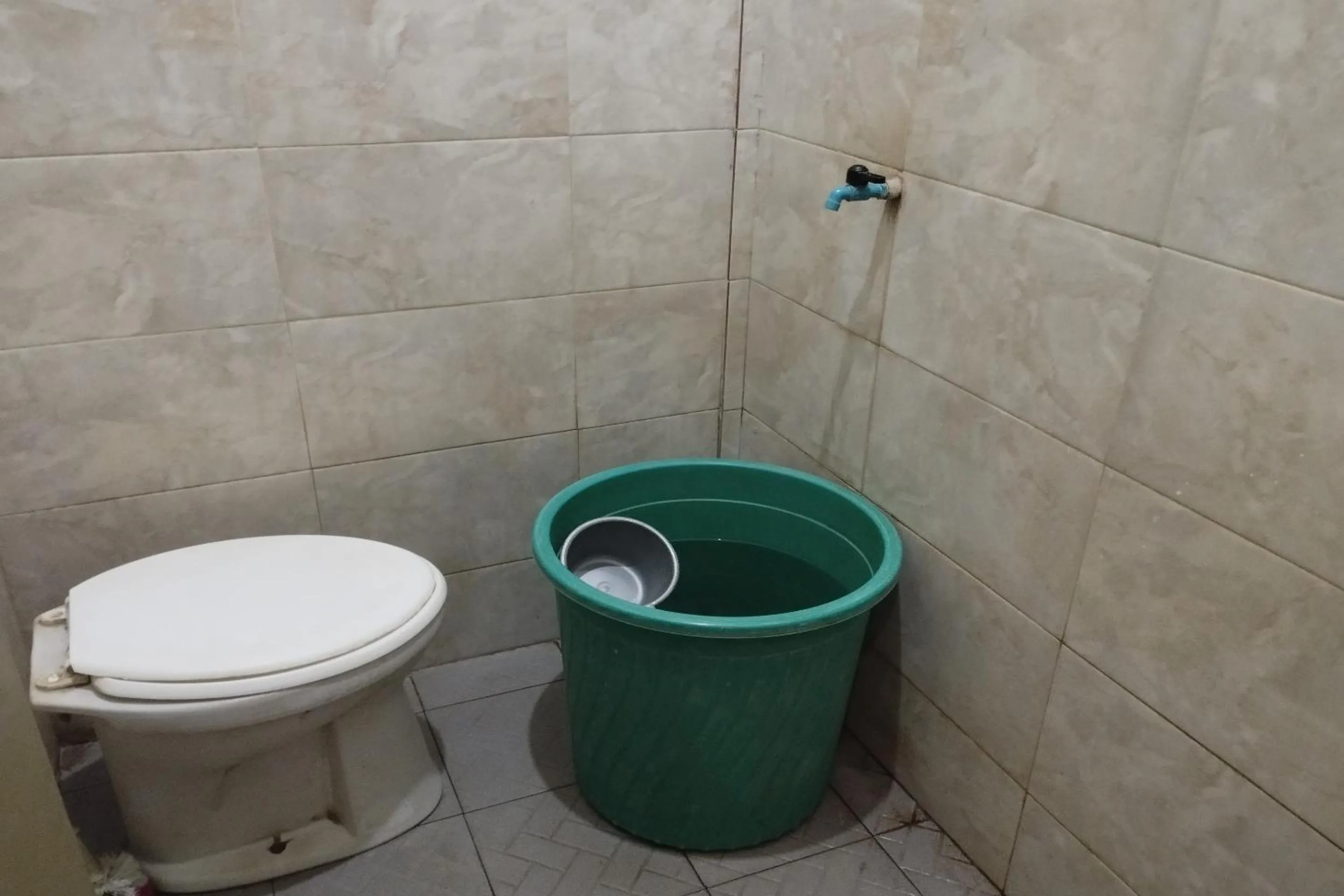 Bathroom in Hotel O Madame Guesthouse