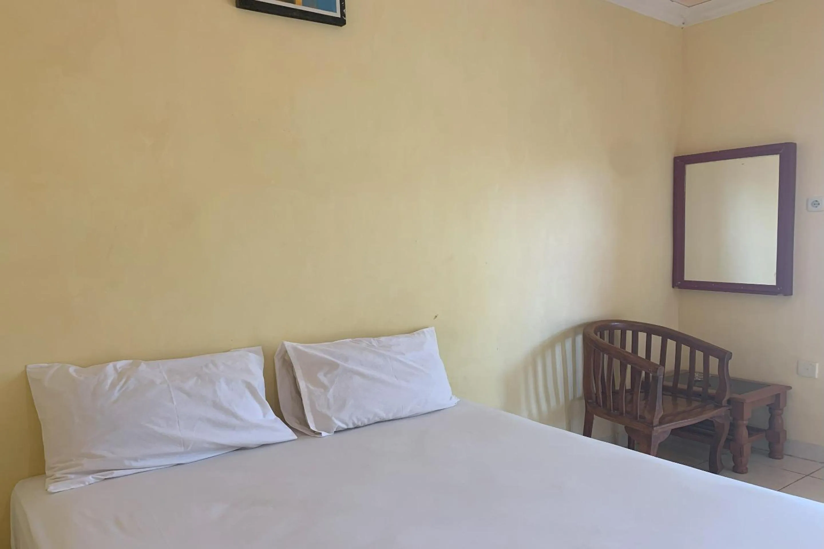 Bedroom, Bed in Hotel O Rafira Losmen NearYani Heahlerr