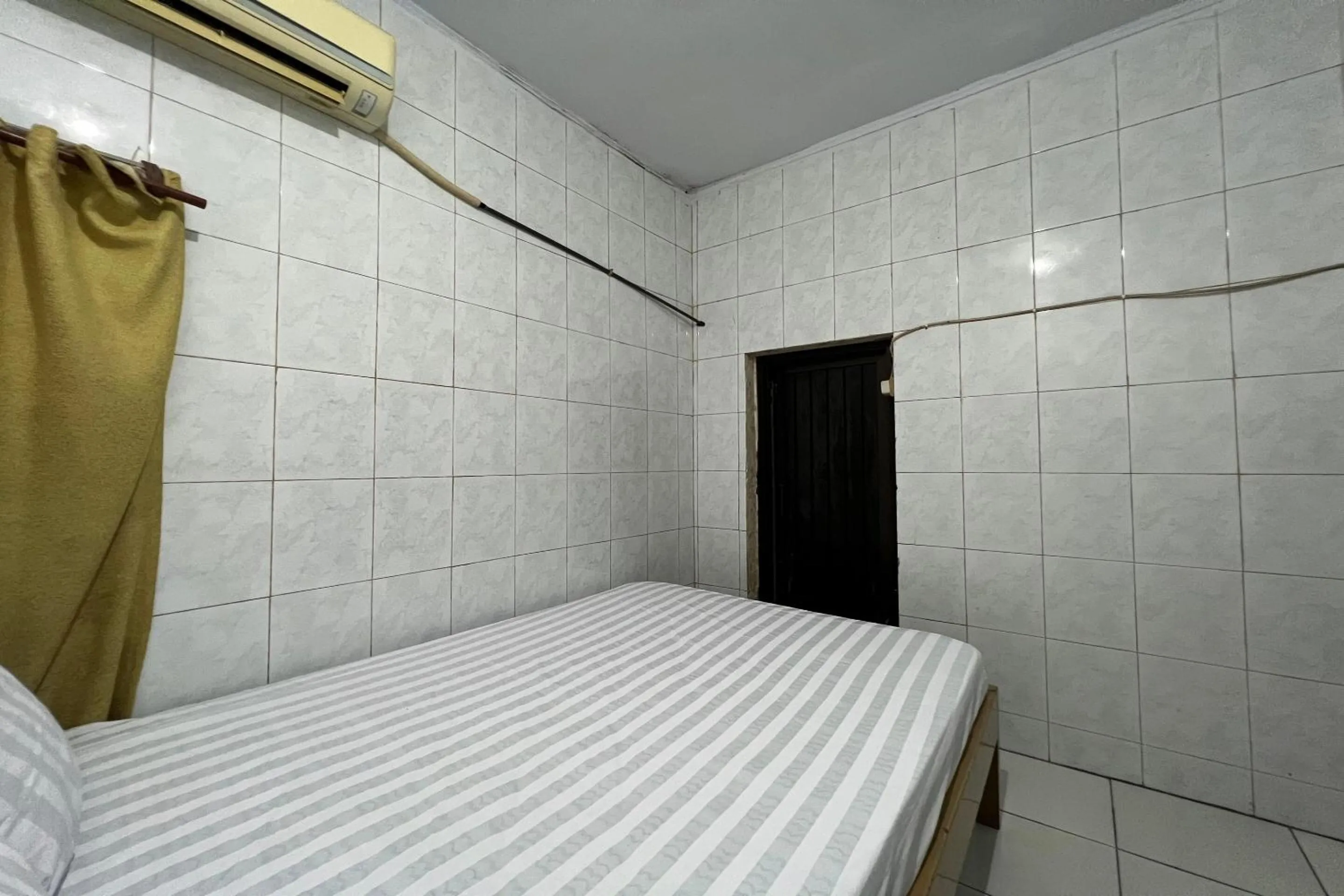 Bedroom, Bed in Hotel O Rafira Losmen NearYani Heahlerr