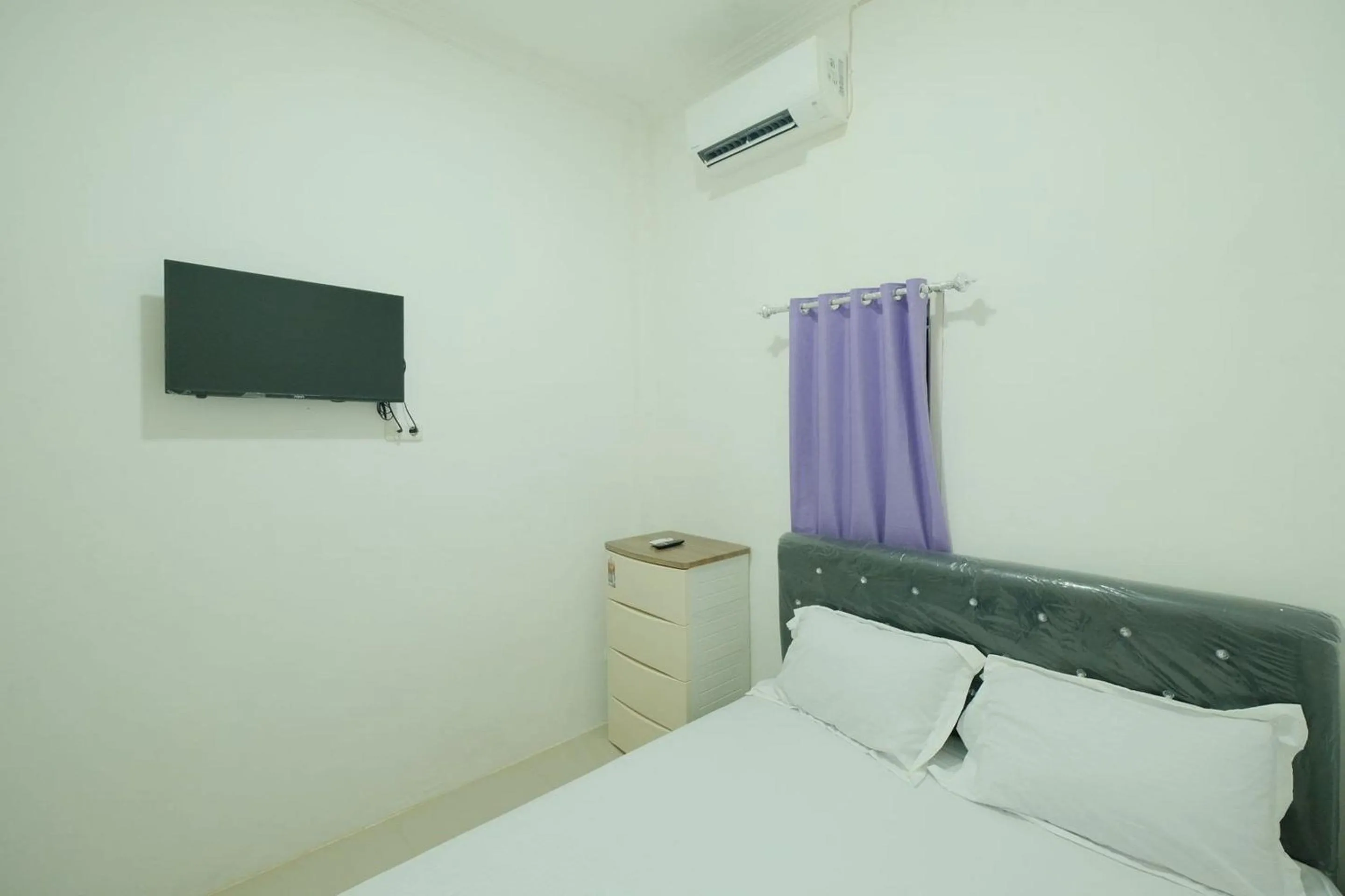 Bedroom, Bed in OYO 93756 Qq Kost Near Pantai Kebesaran Beach