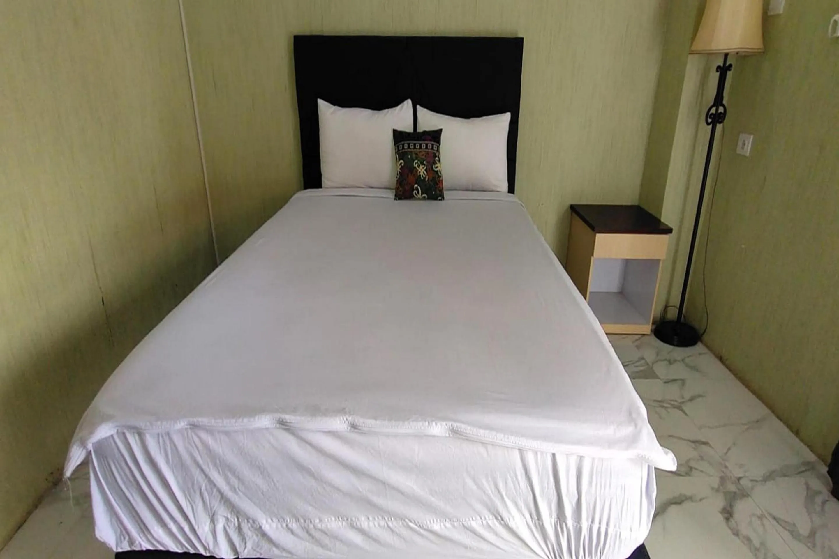 Bedroom, Bed in Hotel O Homestay Citra