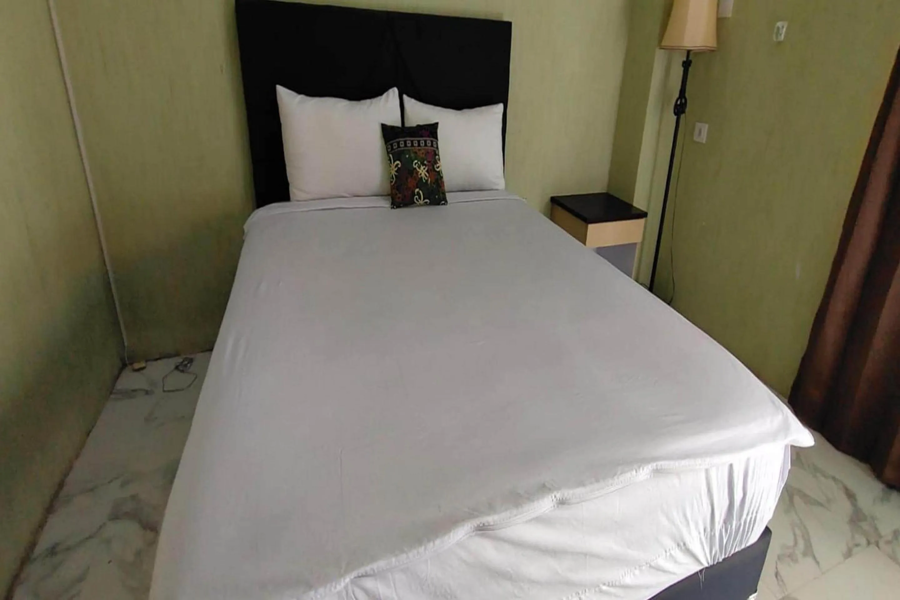 Bedroom, Bed in Hotel O Homestay Citra