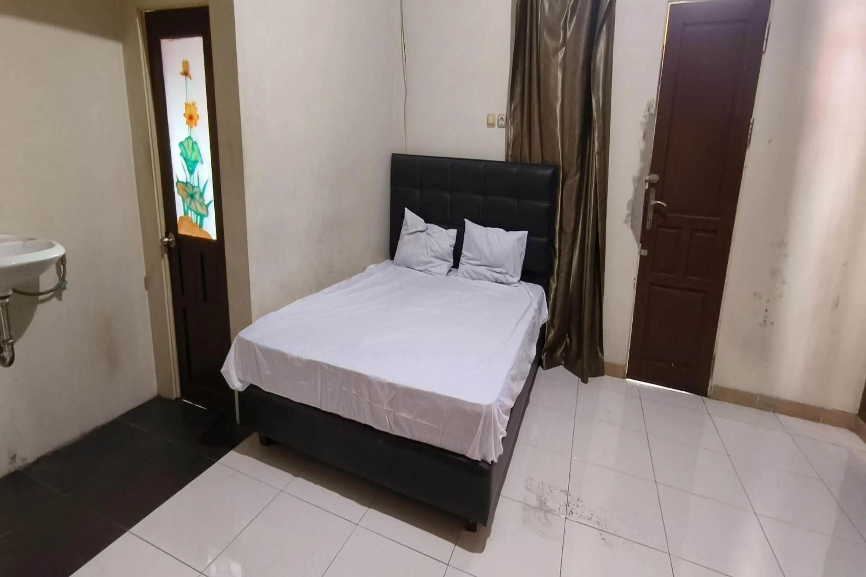 Bedroom, Bed in Hotel O Aglo Homestay NearYani Heahlerr