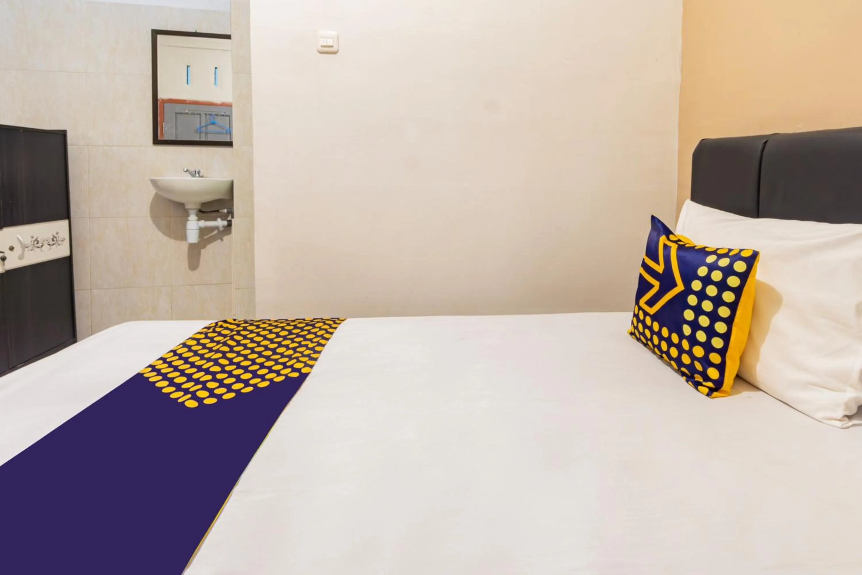 Bedroom in Hotel O Siwalanpanji Homestay Syariah