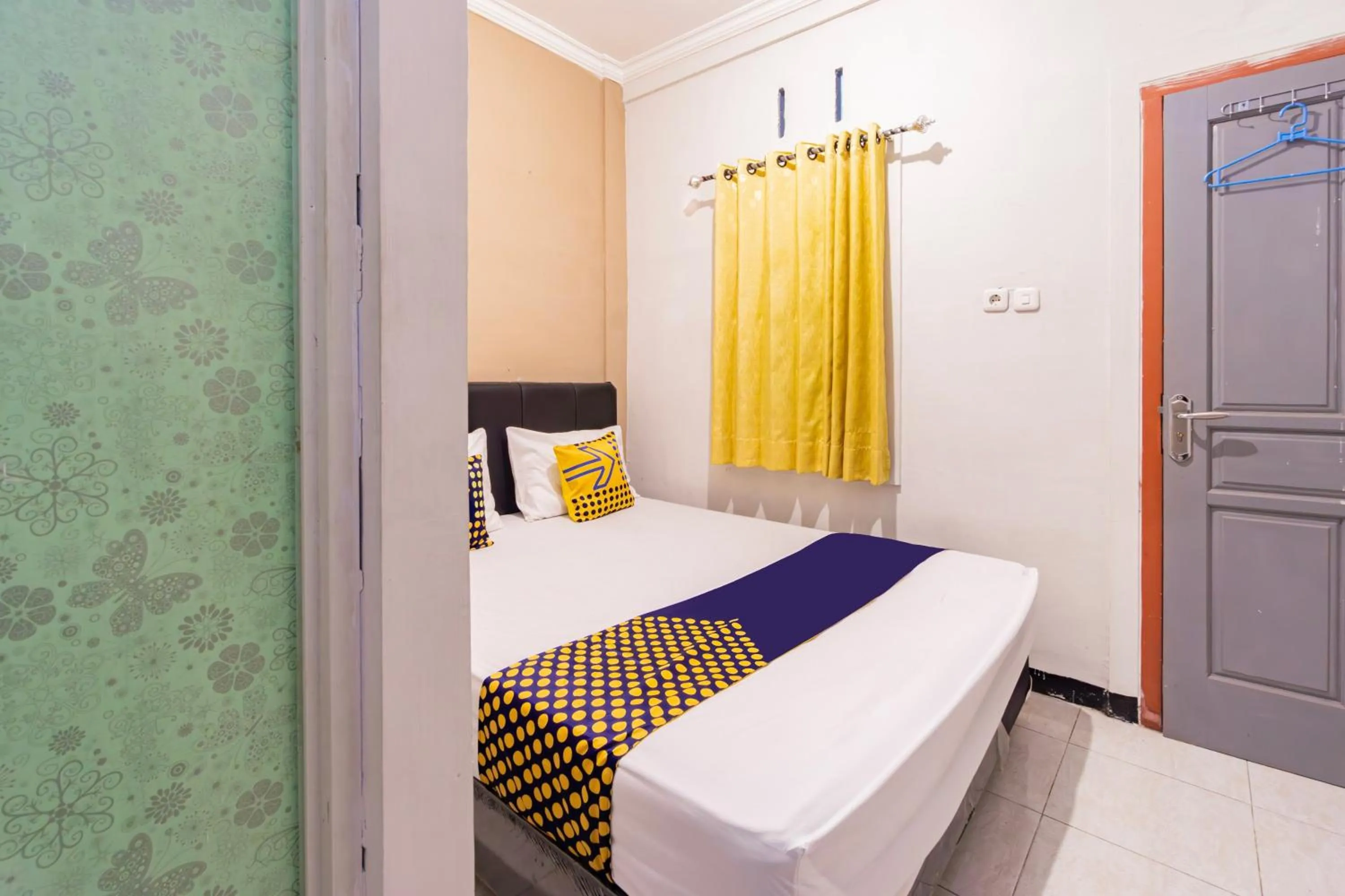 Bedroom in Hotel O Siwalanpanji Homestay Syariah