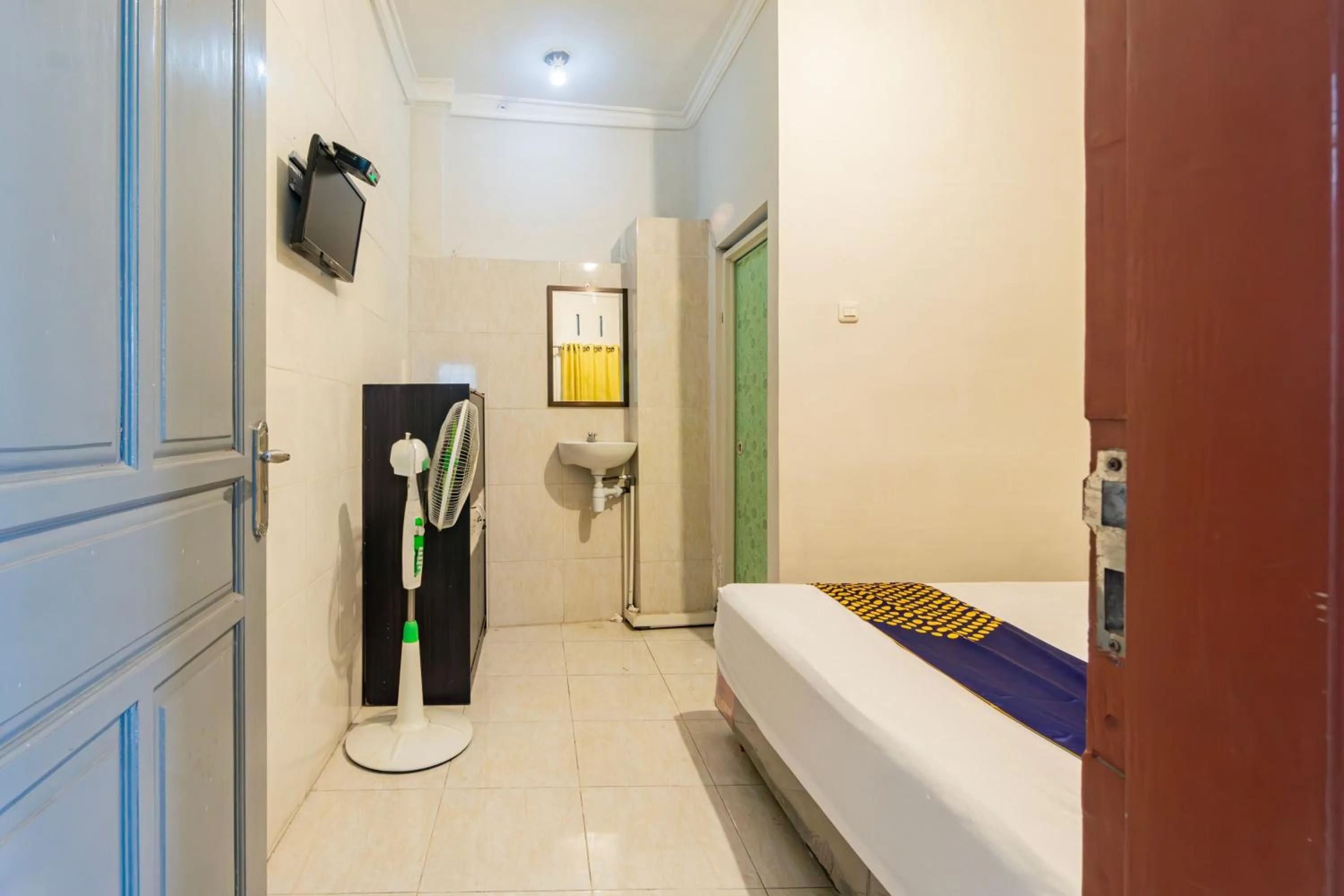 Bedroom in Hotel O Siwalanpanji Homestay Syariah