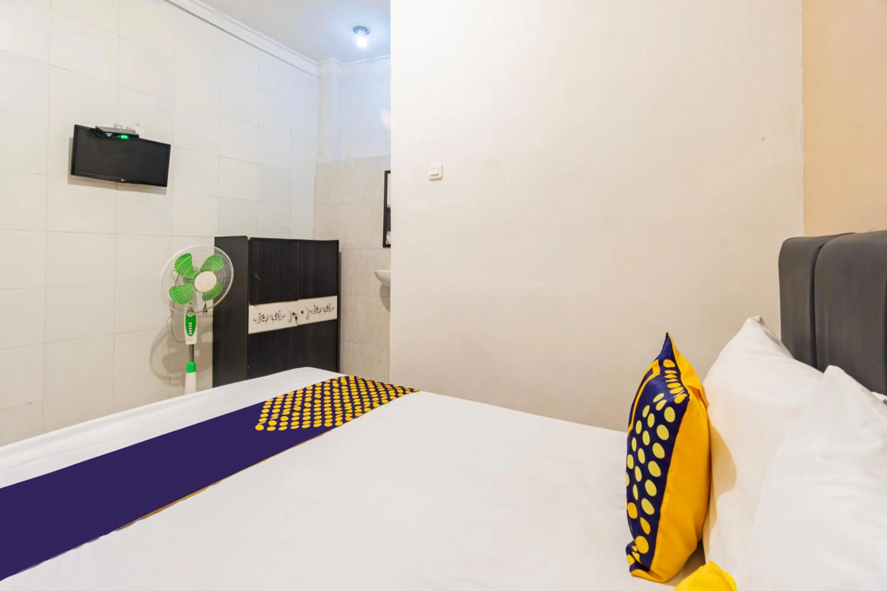 Bedroom in Hotel O Siwalanpanji Homestay Syariah