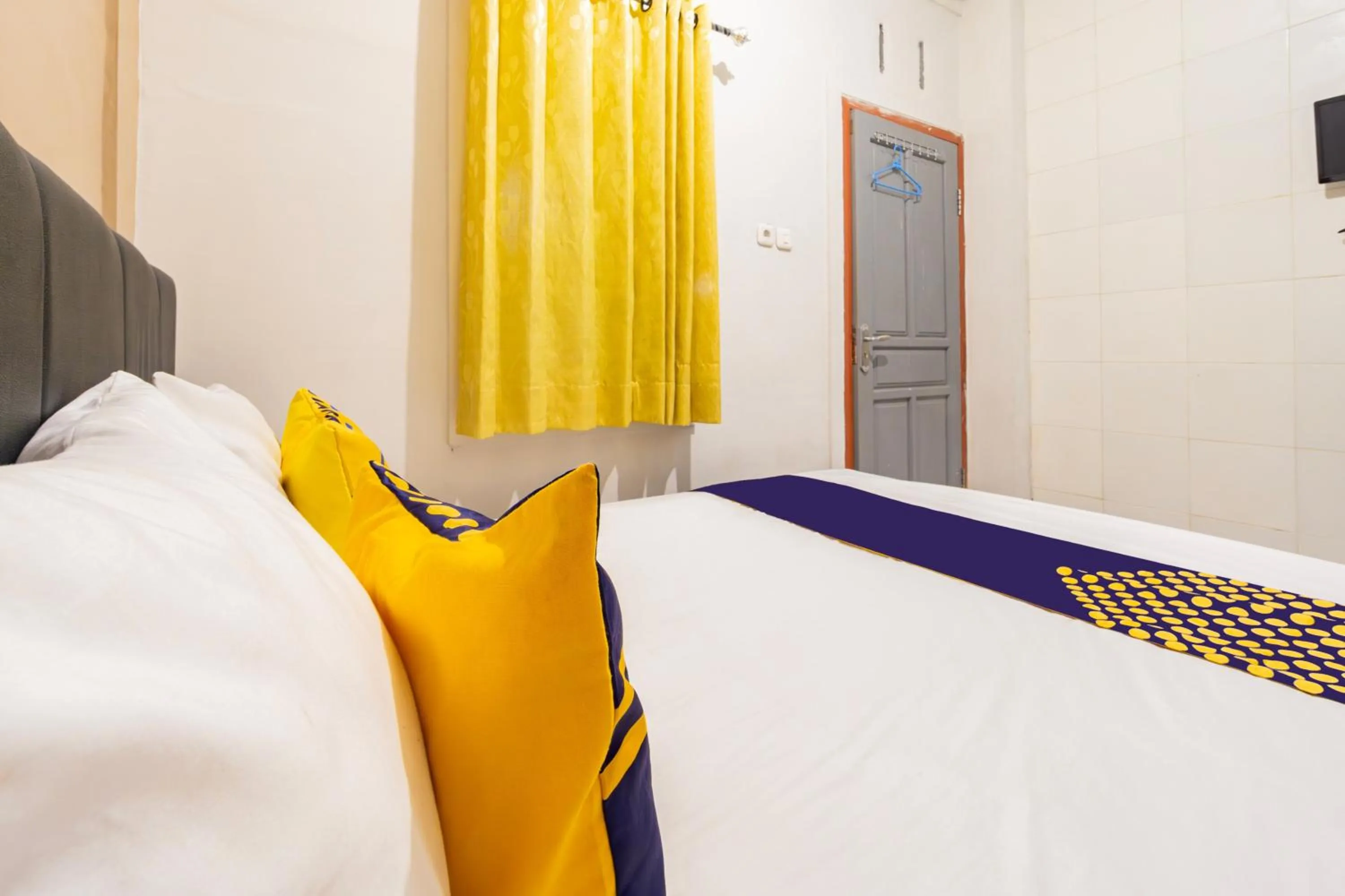 Bedroom in Hotel O Siwalanpanji Homestay Syariah