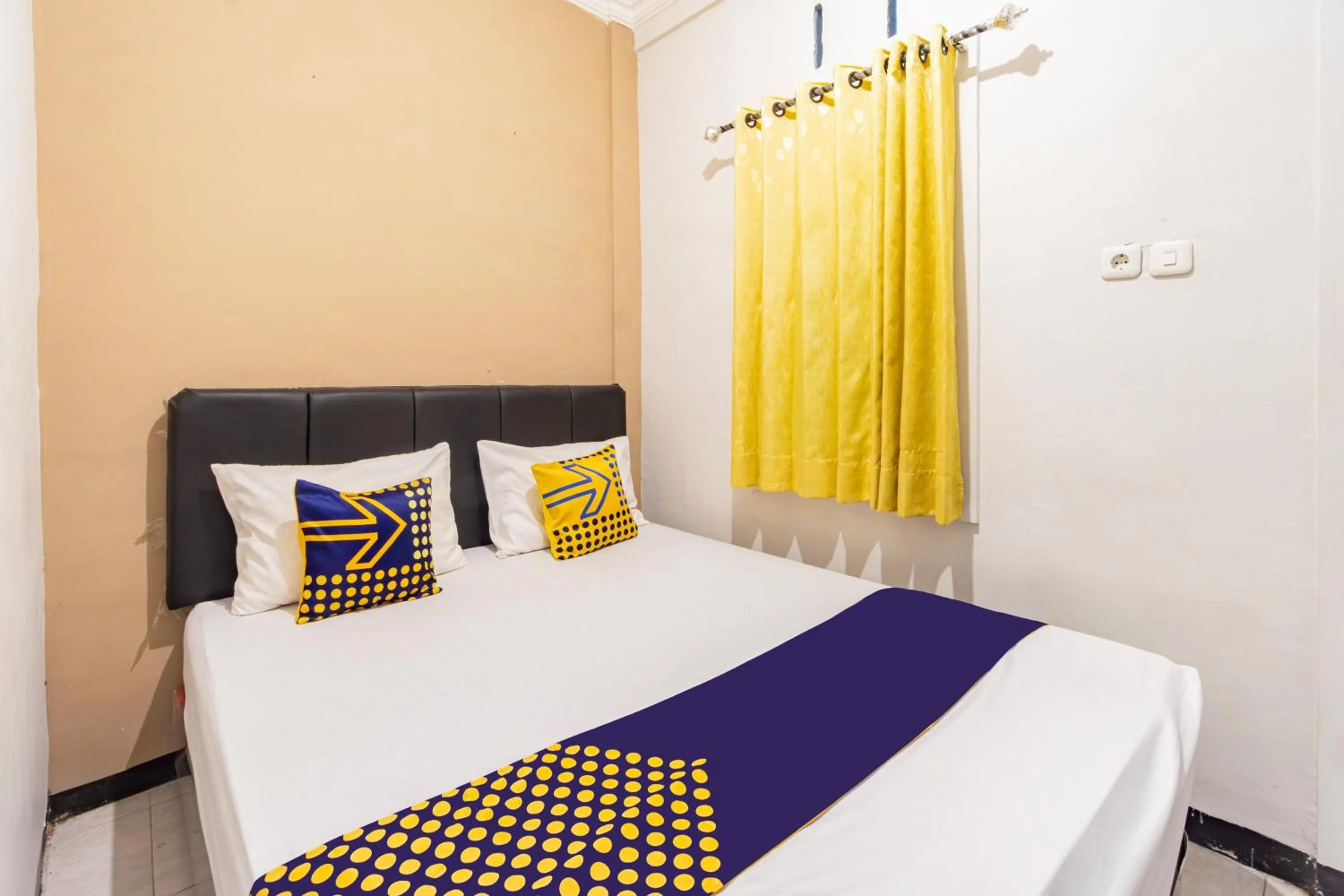 Bedroom in Hotel O Siwalanpanji Homestay Syariah