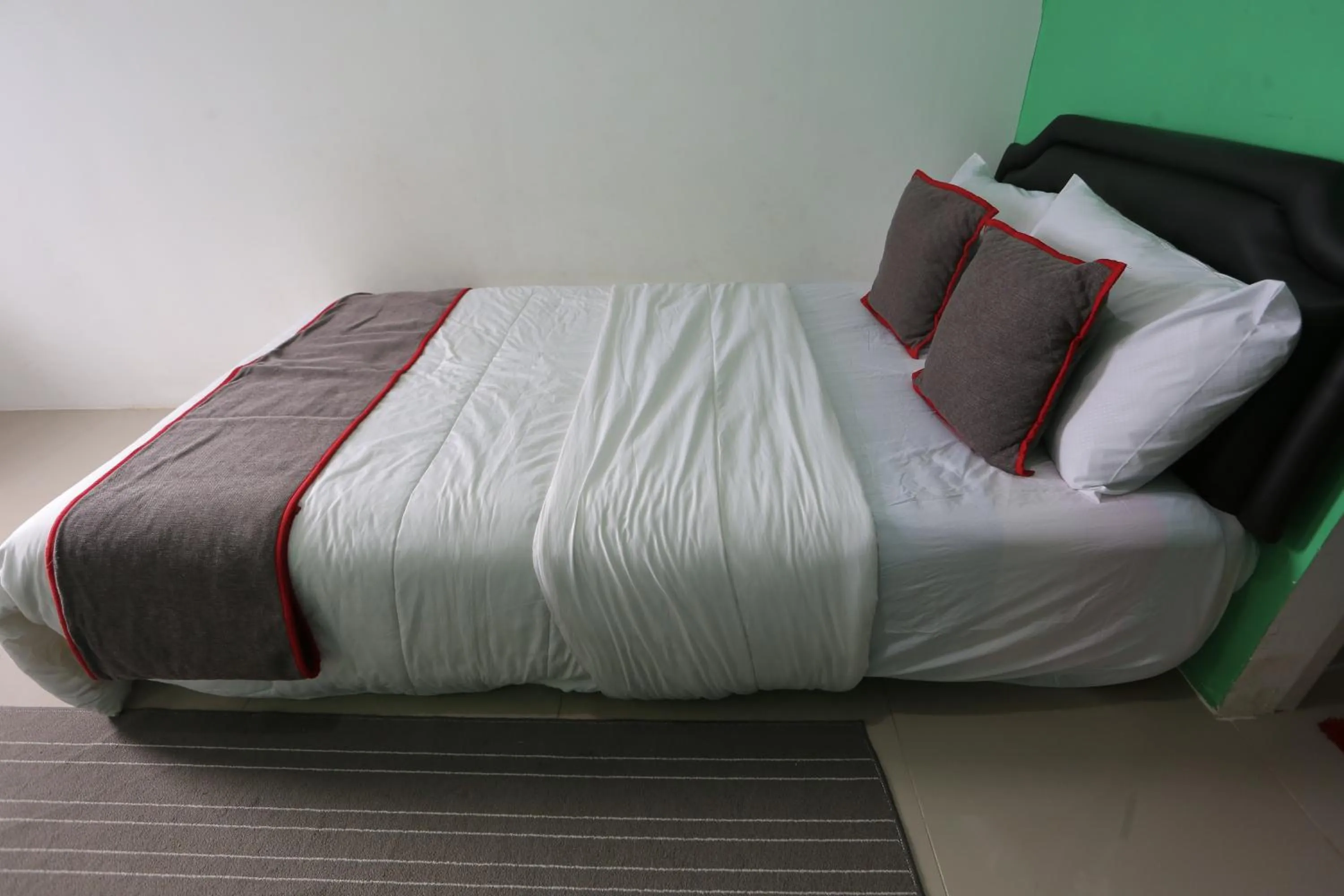 Bedroom in Collection O 93750 Luxury Rooms @ Urbantown Serpong