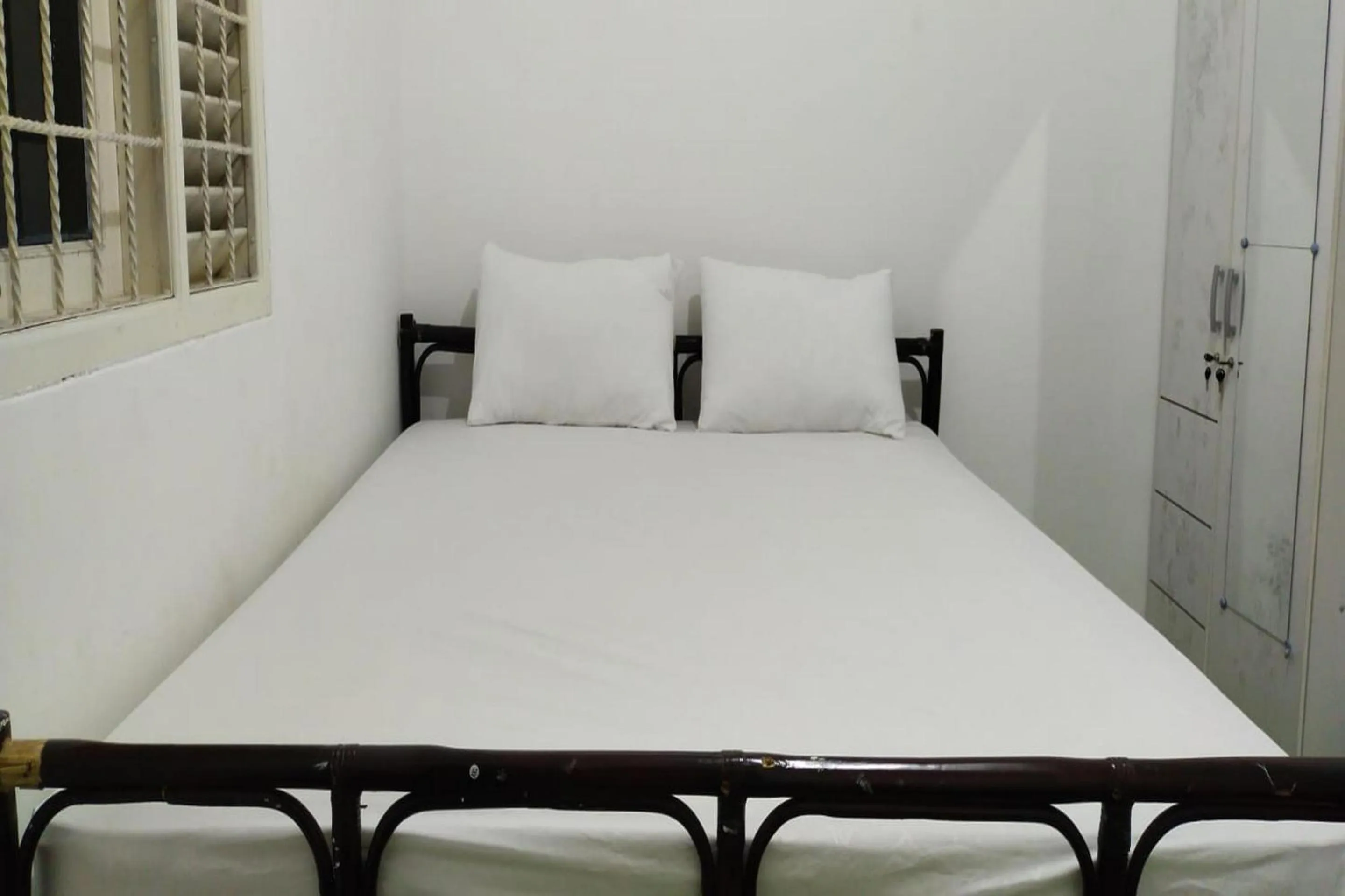 Bedroom, Bed in OYO 93774 Khaira Kos Dan PenginapanNearYani Heahlerr