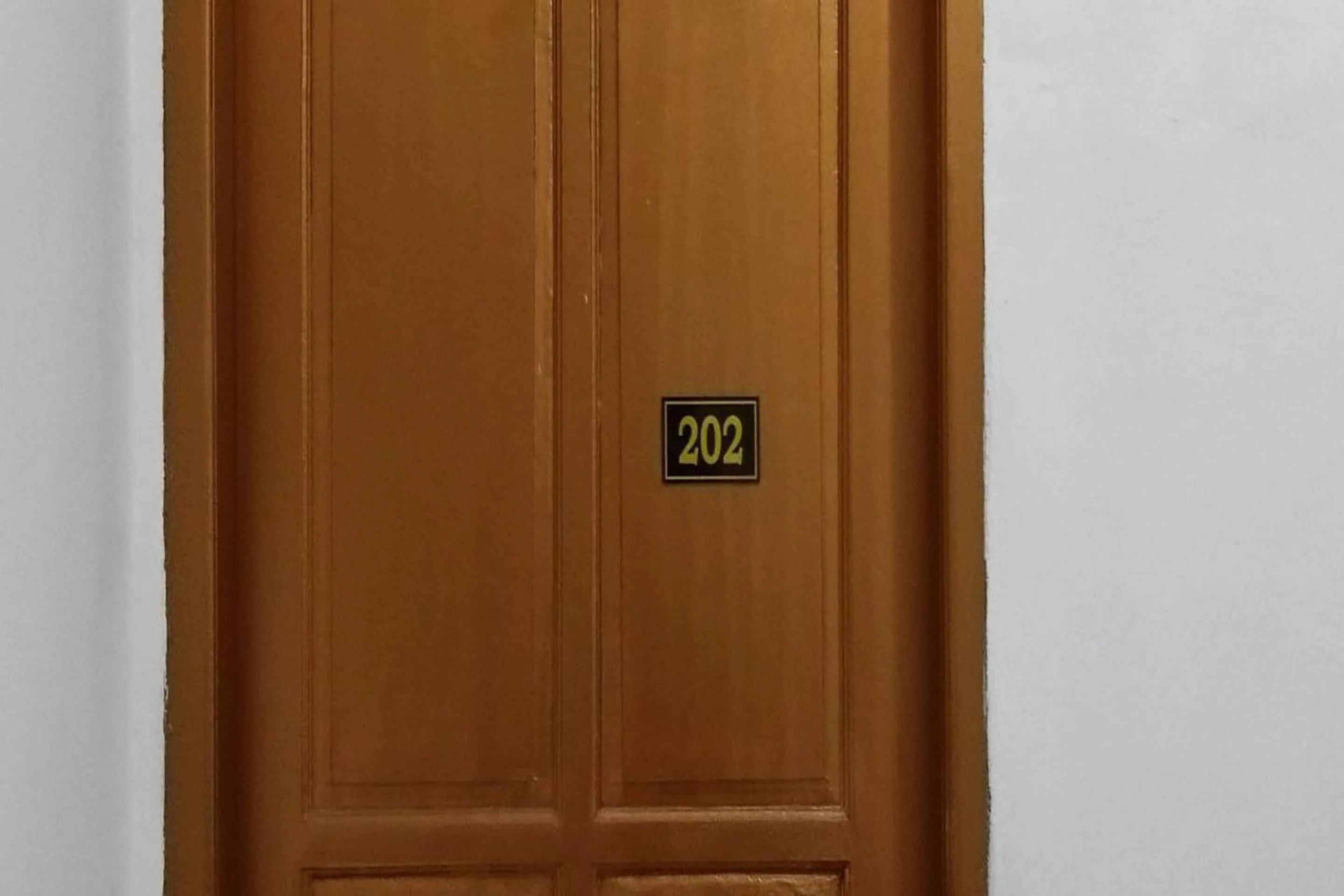 Bedroom in OYO 93774 Khaira Kos Dan PenginapanNearYani Heahlerr