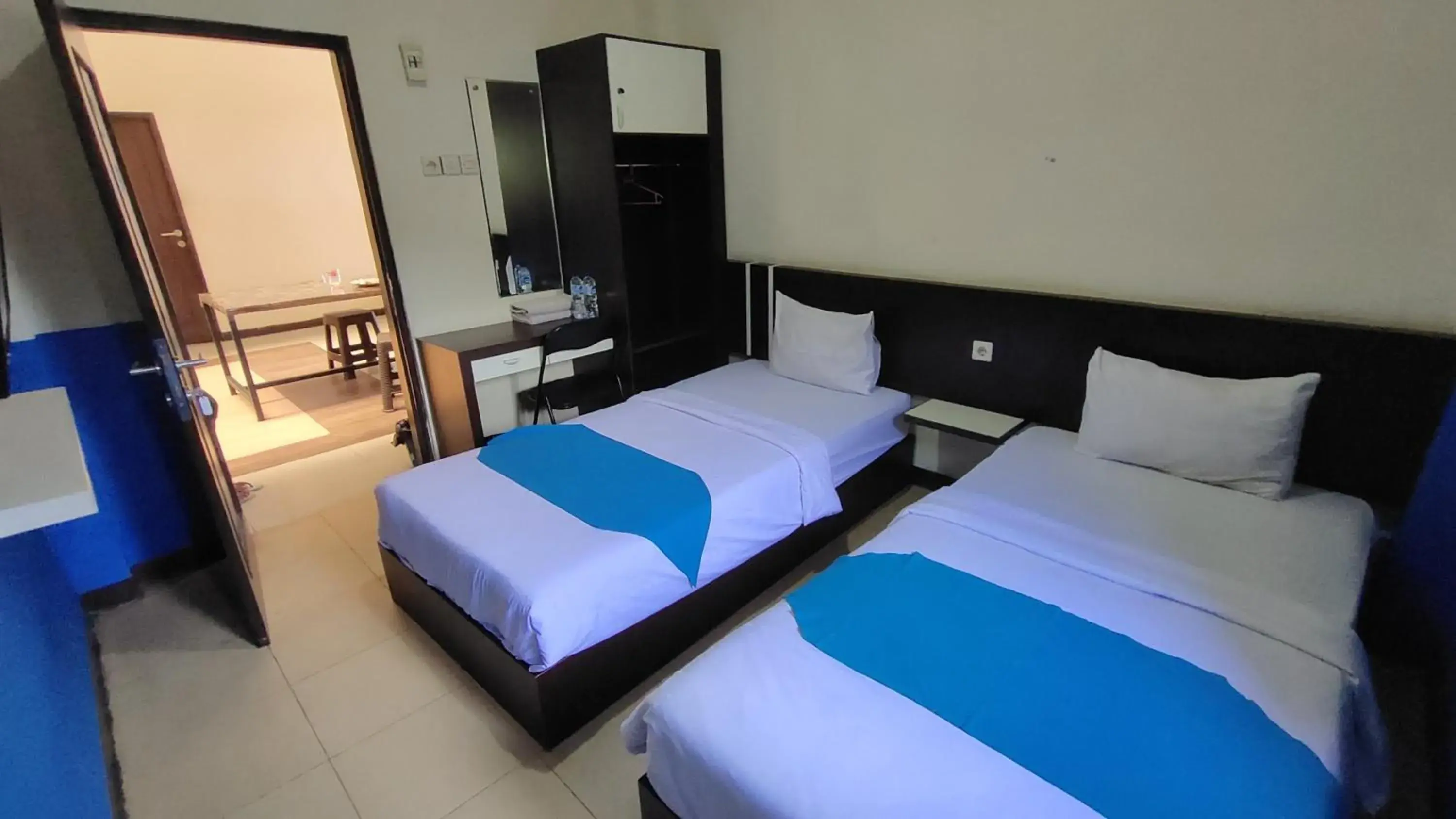 Standard Twin Room in Hotel O Nilam Guest HouseNearYani Heahlerr Standard Twin Room in Hotel O Nilam Guest HouseNearYani Heahlerr
