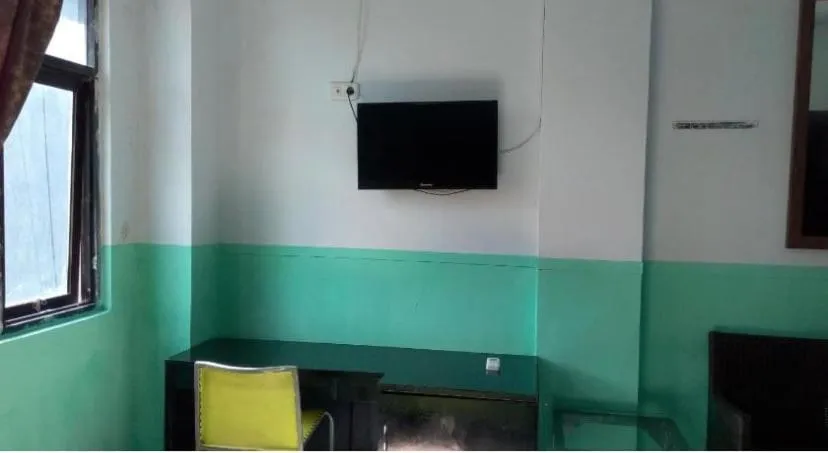 Bedroom in Hotel O Nilam Guest HouseNearYani Heahlerr