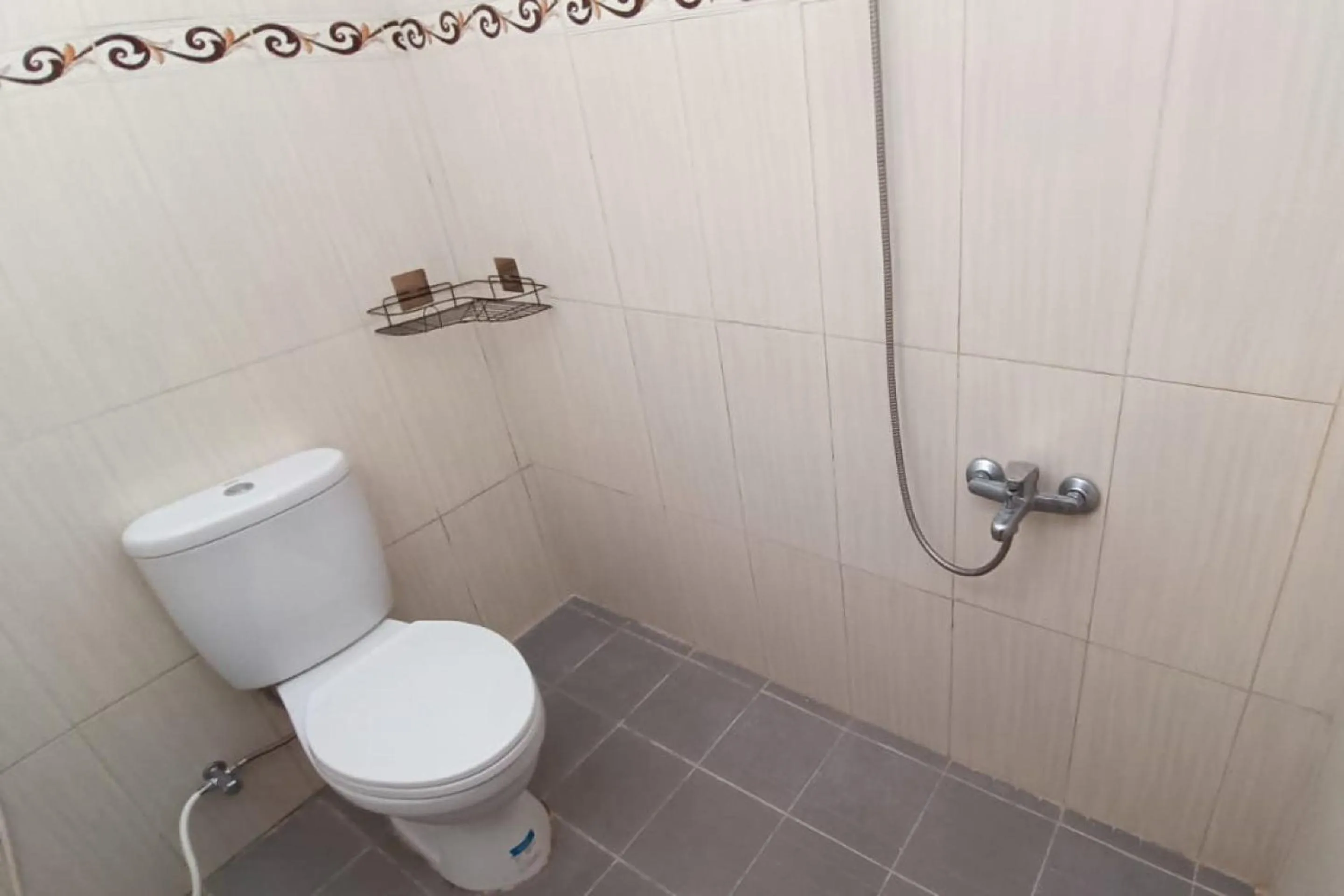 Bathroom in Hotel O Bumi Tenang Homestay