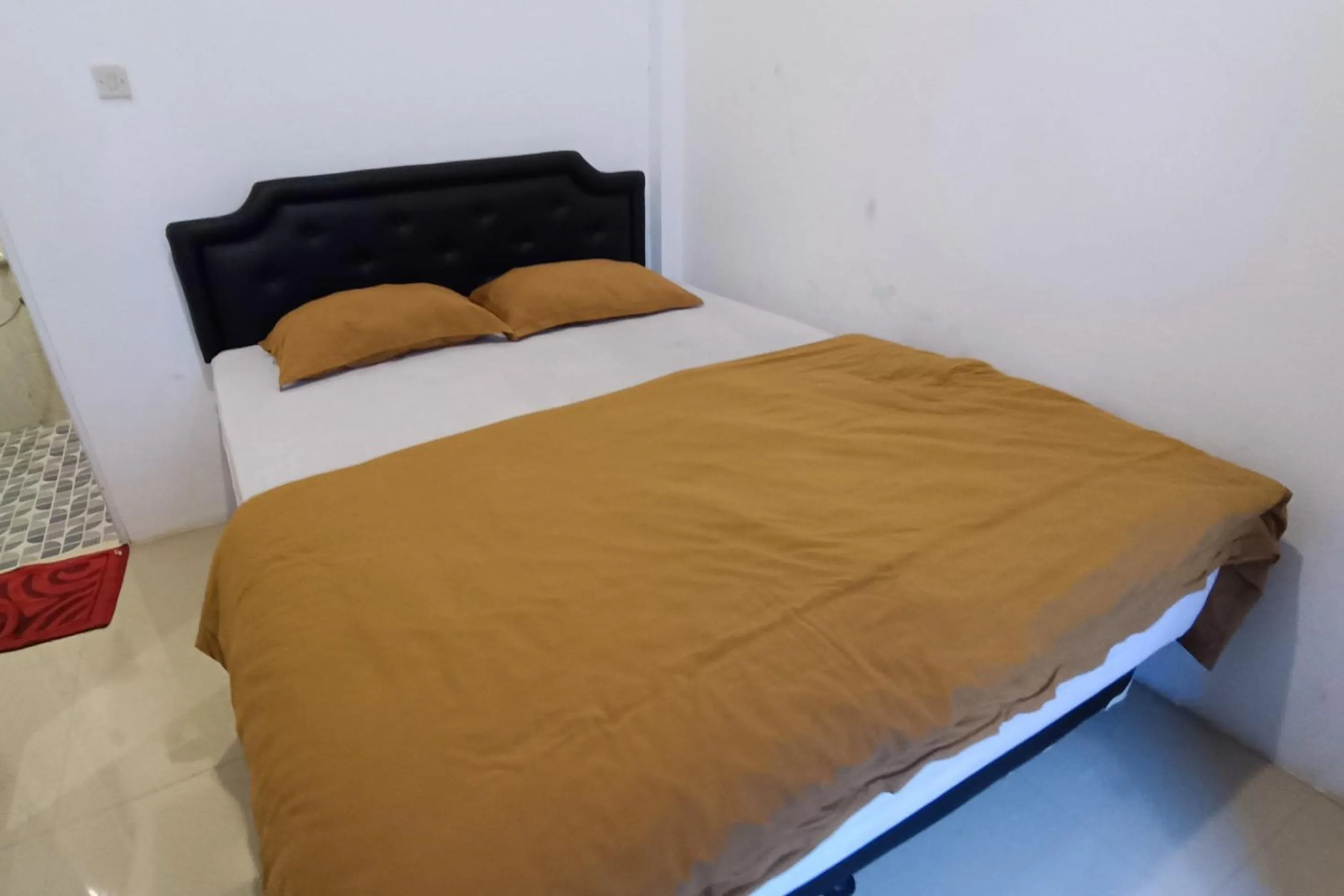 Bedroom, Bed in Hotel O Bumi Tenang Homestay