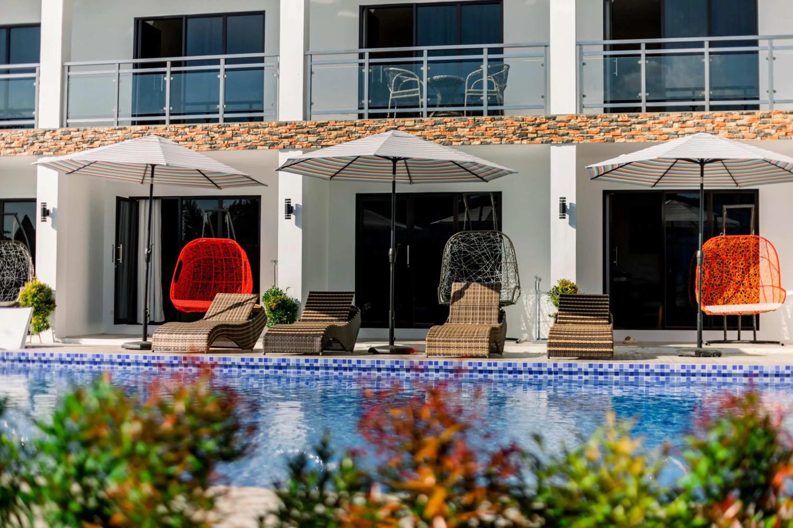 Property building in Sonrisa Resort De Playa by Hiverooms