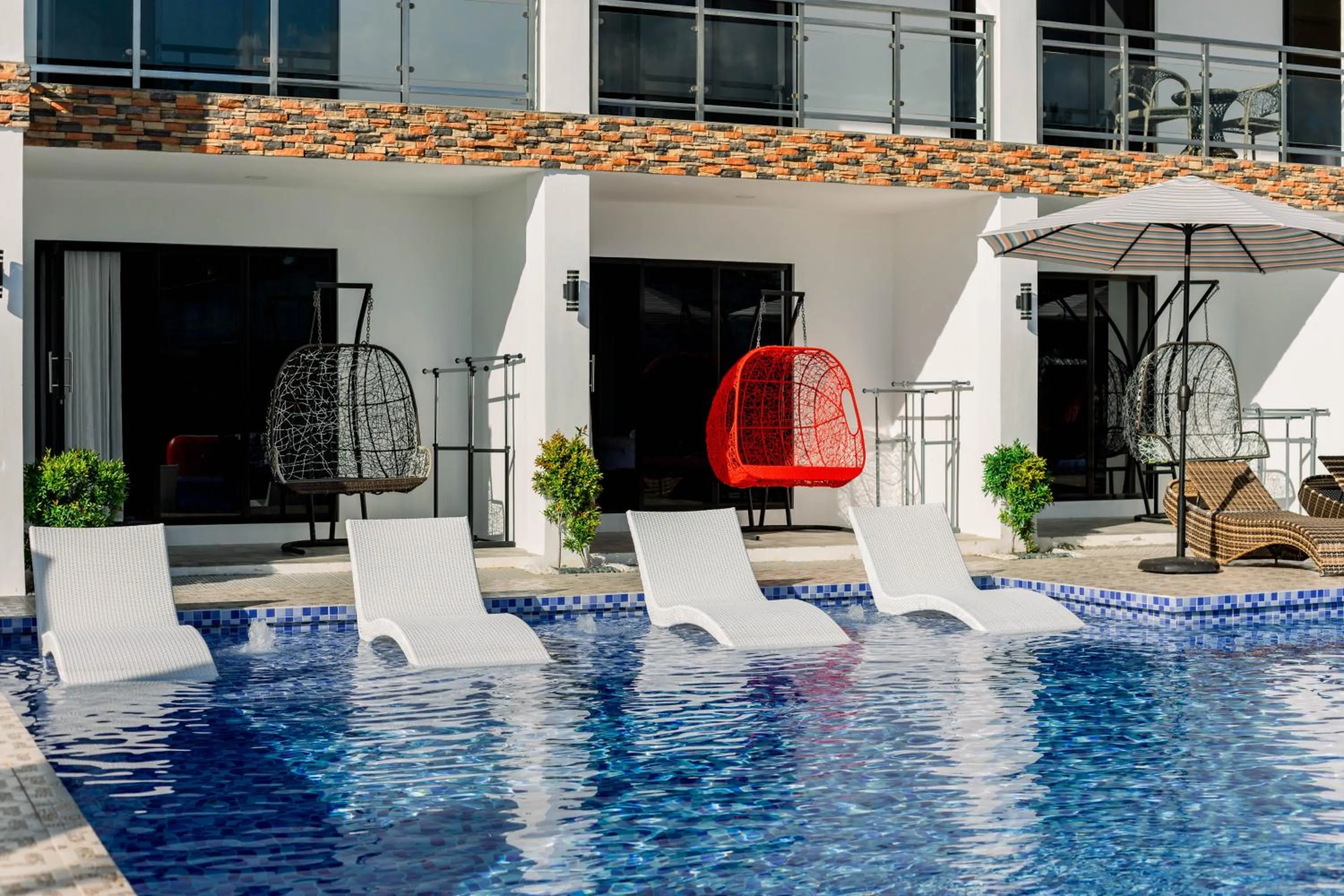 Property building in Sonrisa Resort De Playa by Hiverooms