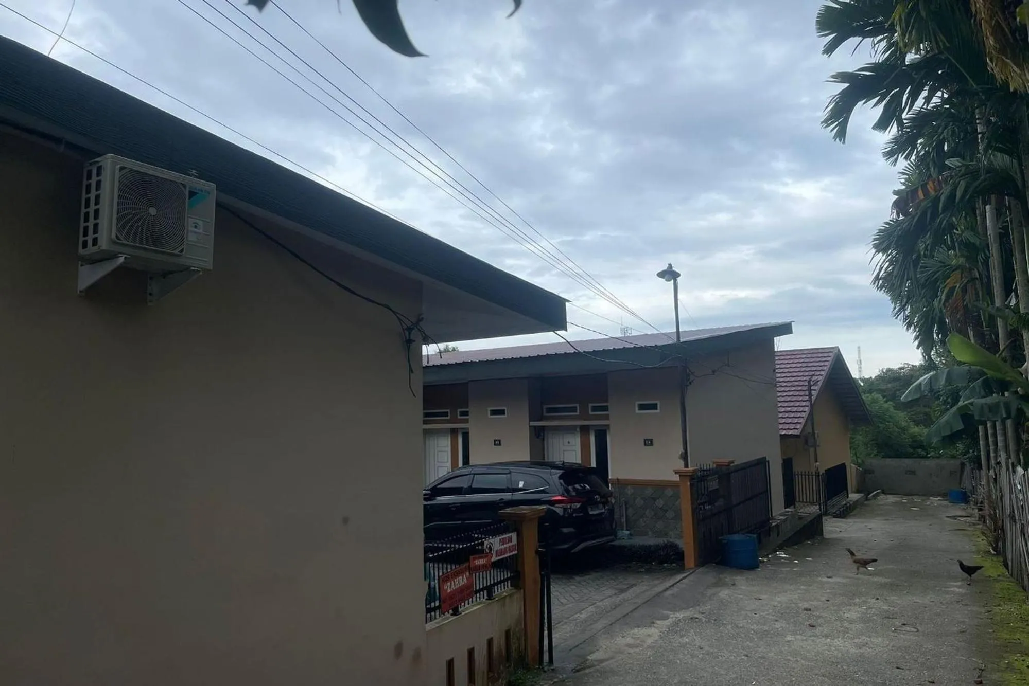 Facade/entrance in Hotel O Aksana Homestay SyariahNearWonderland Trik Art