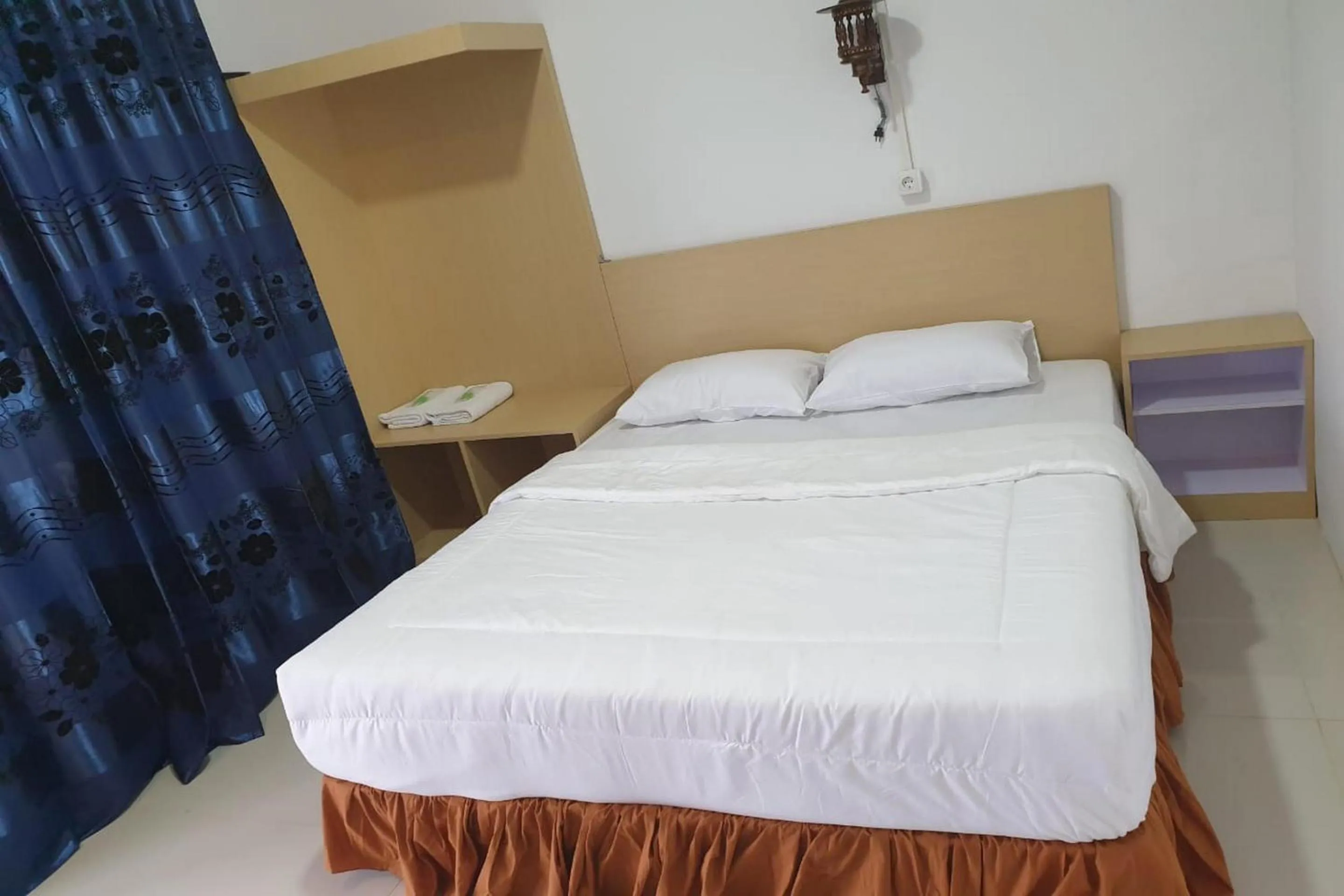 Bedroom, Bed in Hotel O Penginapan Naya Rita