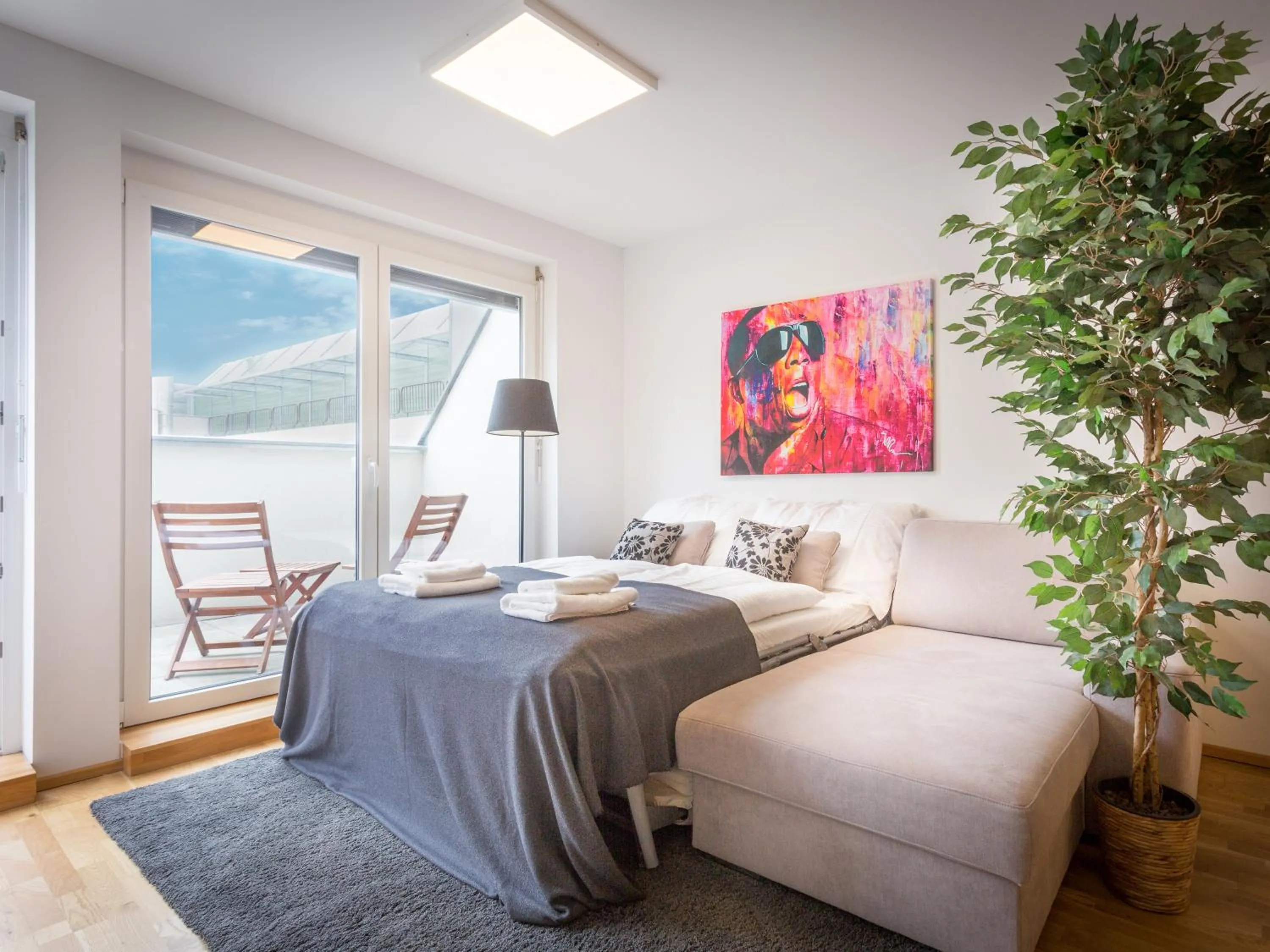 Bed in Penthouse Apartments